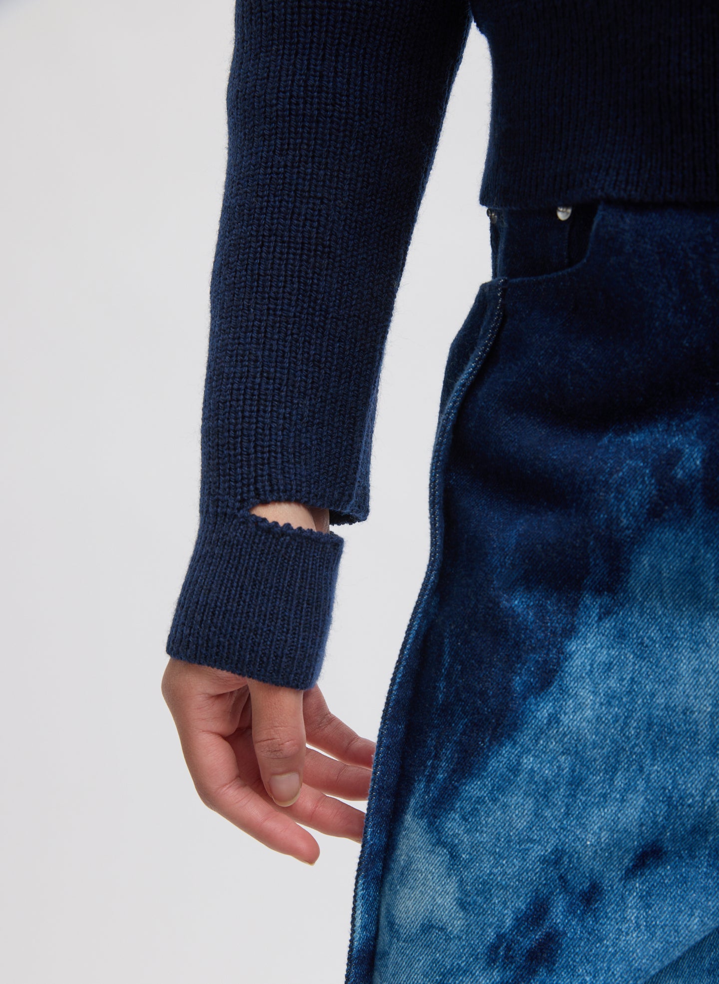 Navy Cardigan Stitch Wool Shrunken Crewneck Pullover - closeup of cutout detail at wrist