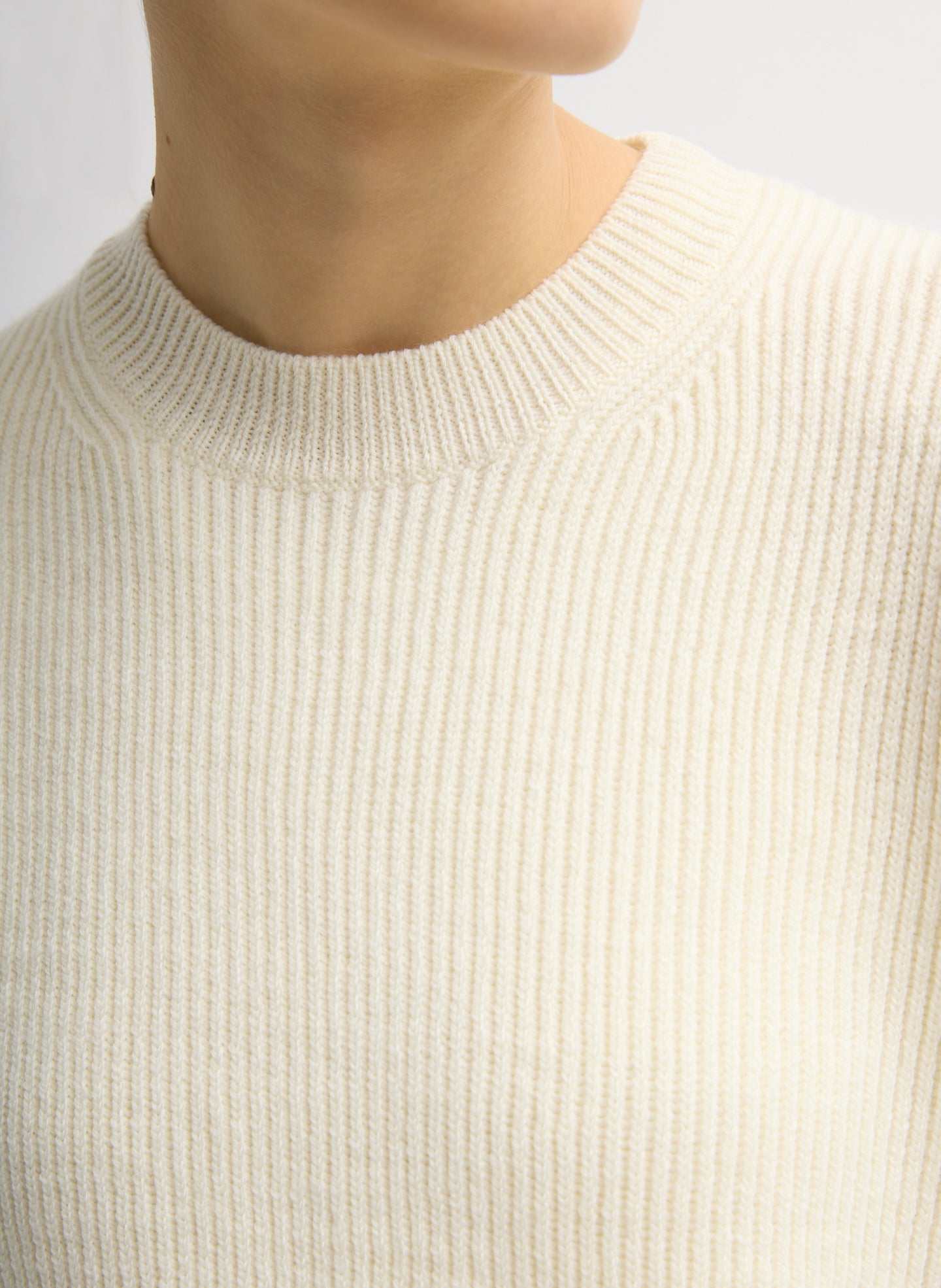 Ivory Cardigan Stitch Split Front Crewneck Easy Pullover - closeup of ribbed neckline