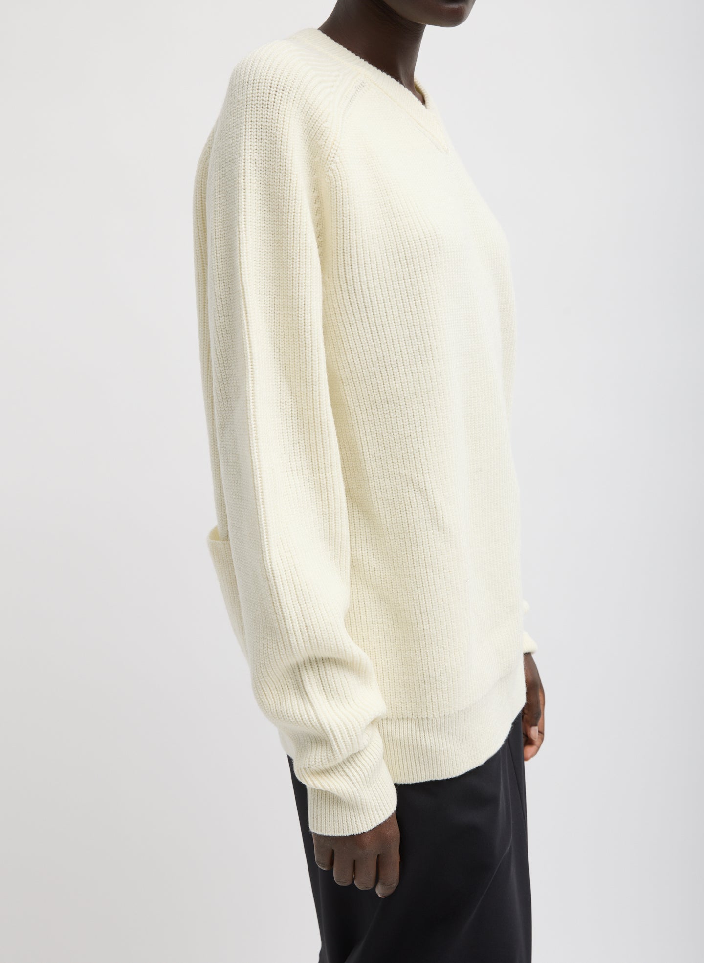Ivory Cardigan Stitch V-Neck Easy Pullover - relaxed fit, side view on model