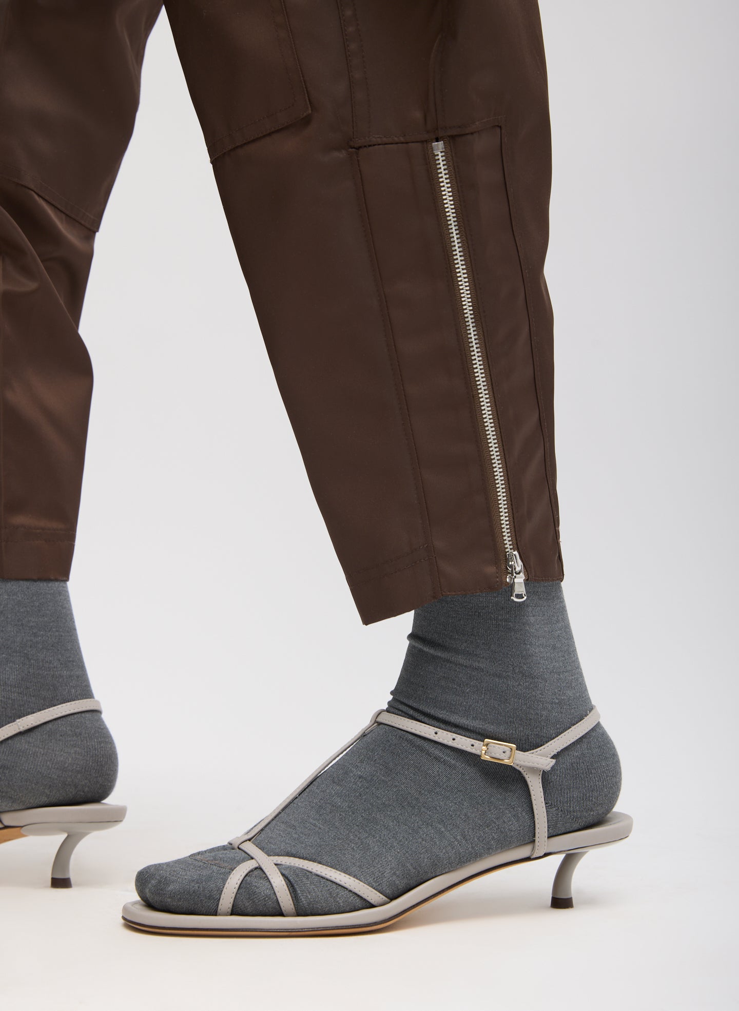 Brown Eco Nylon Colt Trouser - closeup of zip detail at ankle