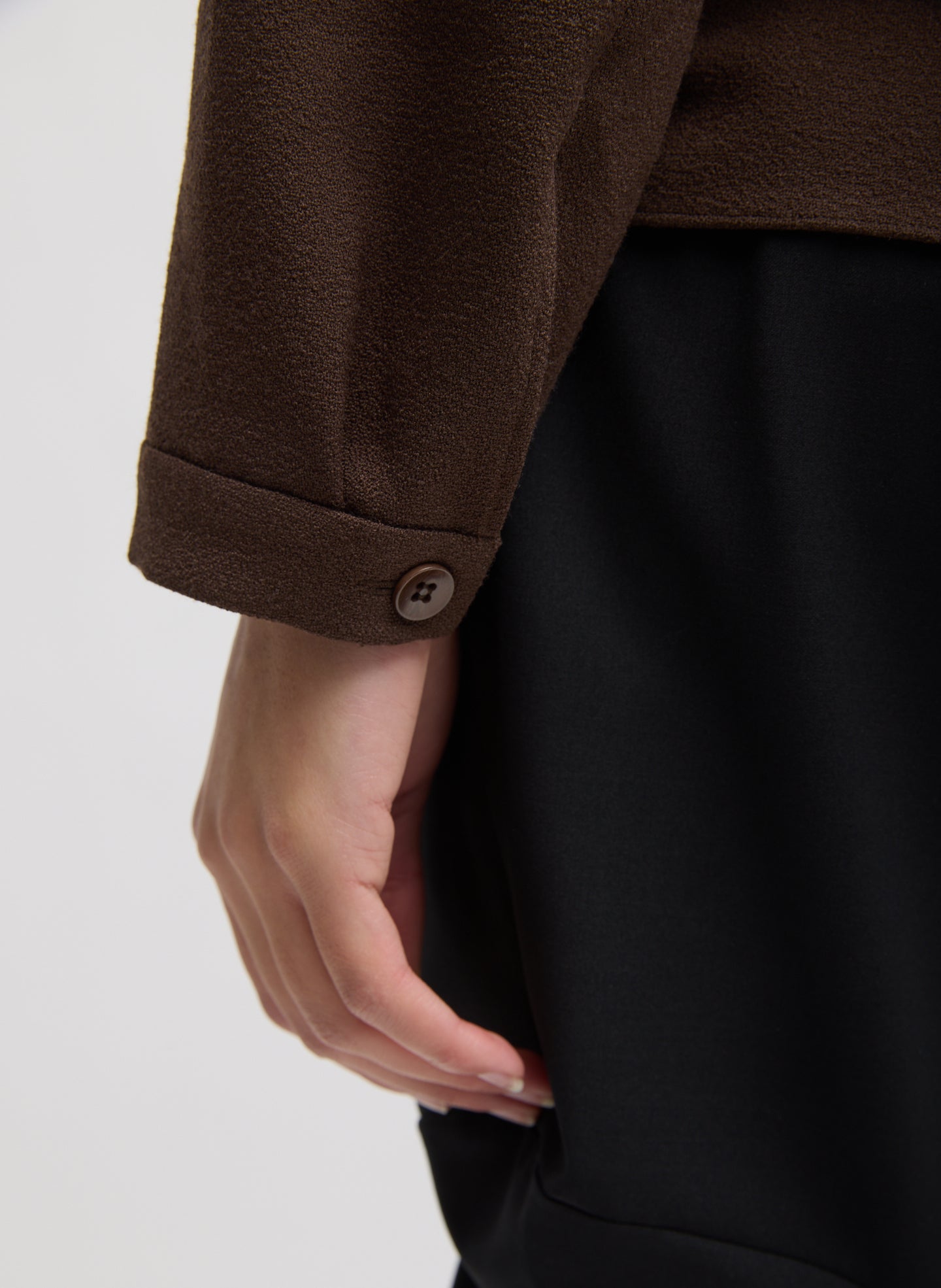 Brown Mica Crepe V-Neck Top - closeup of button detail at sleeve