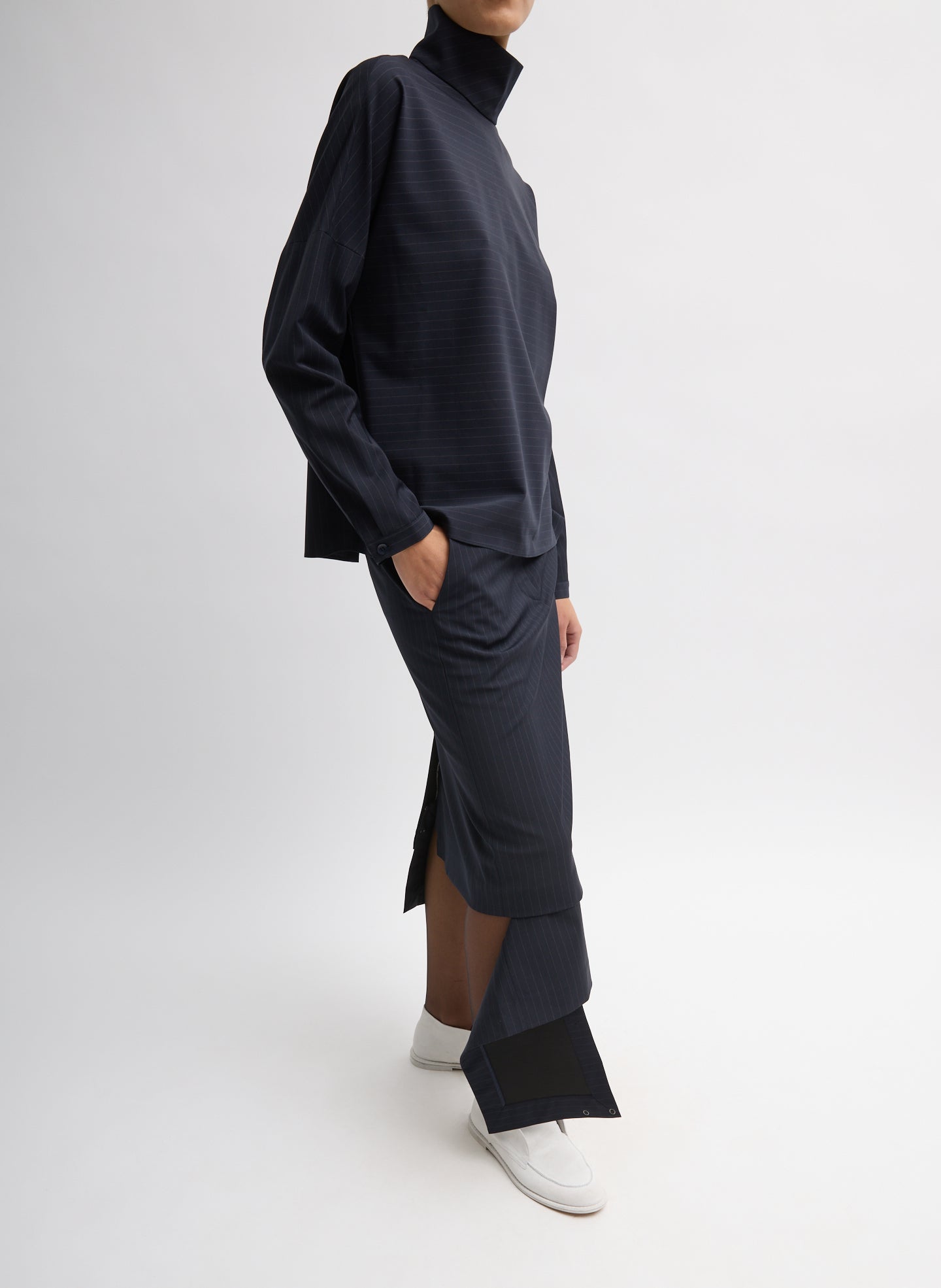 Navy Multi Mier Pinstripe Convertible Skirt - with matching detachable panel, side view on model
