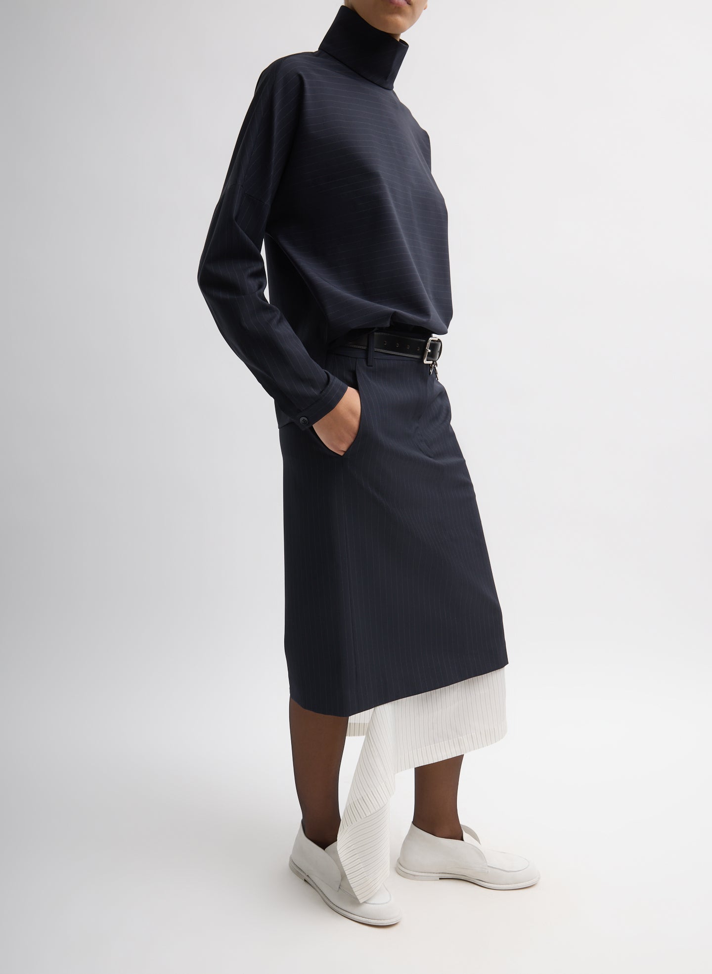 Navy Multi Mier Pinstripe Convertible Skirt - with contrasting detachable panel, side view on model