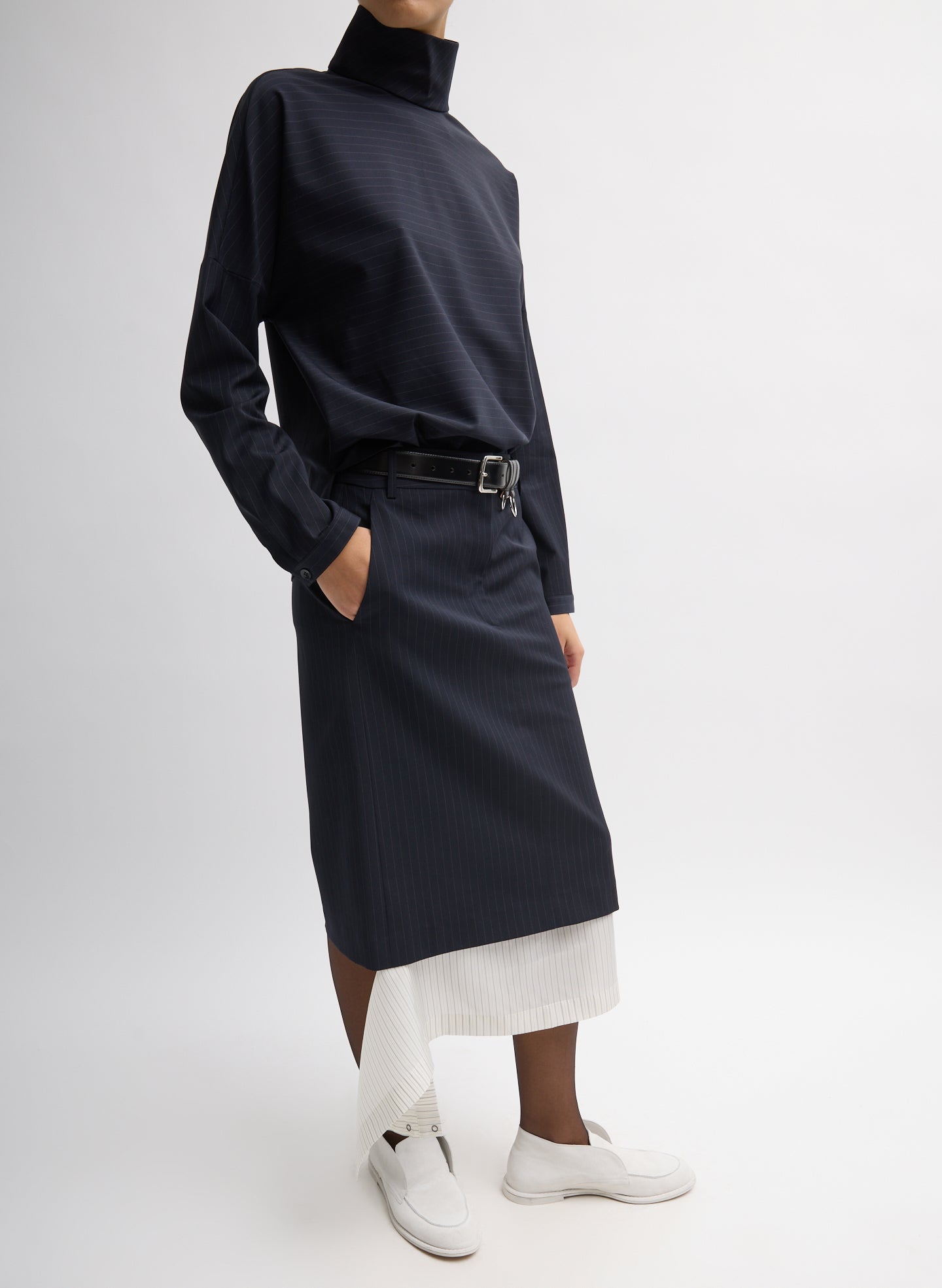 Navy Multi Mier Pinstripe Convertible Skirt - with contrasting detachable panel, siide view on model