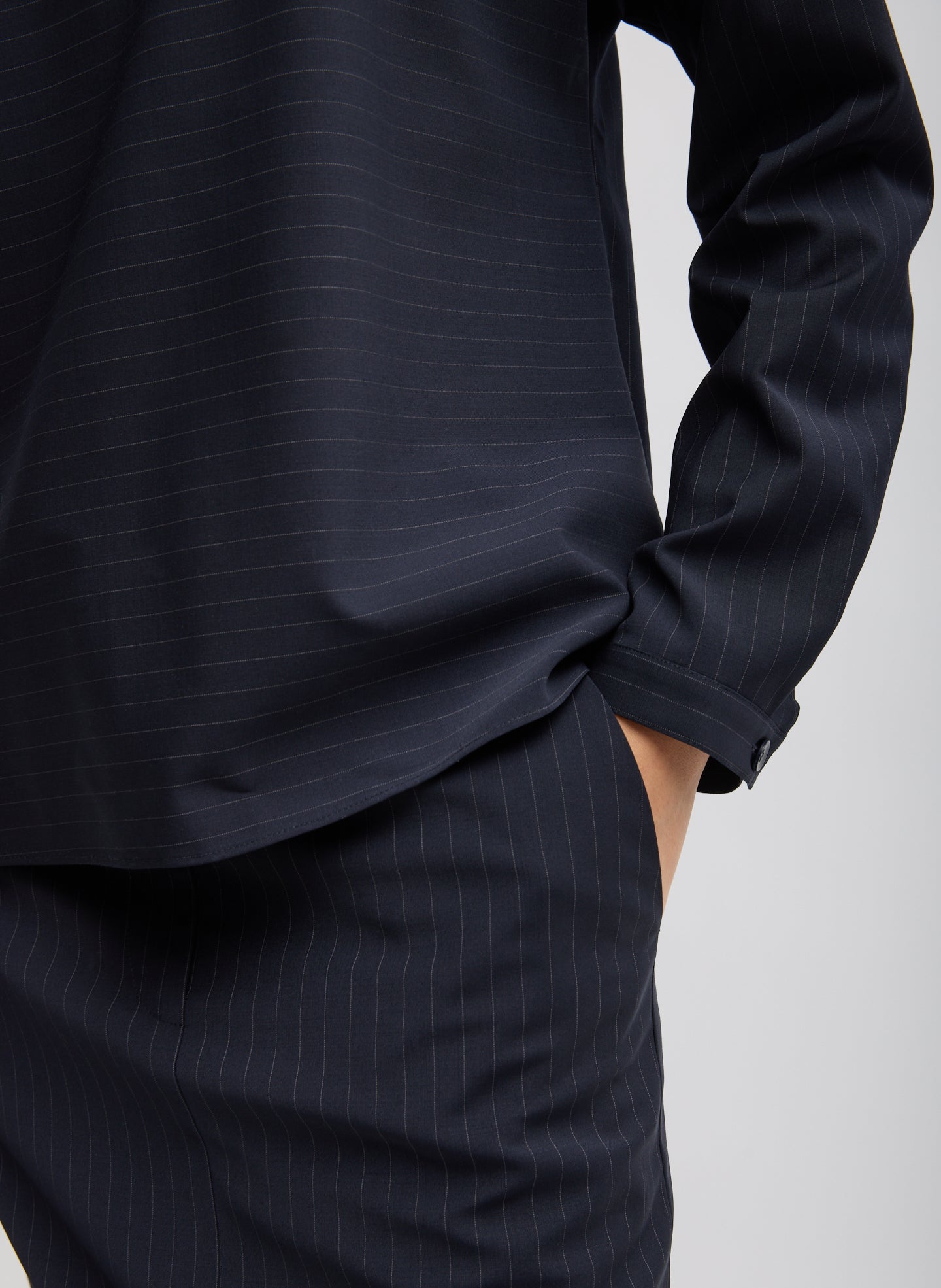 Navy Mier Pinstripe Funnel Neck Dolman Sleeve Top - closeup of stripe pattern and sleeve detail