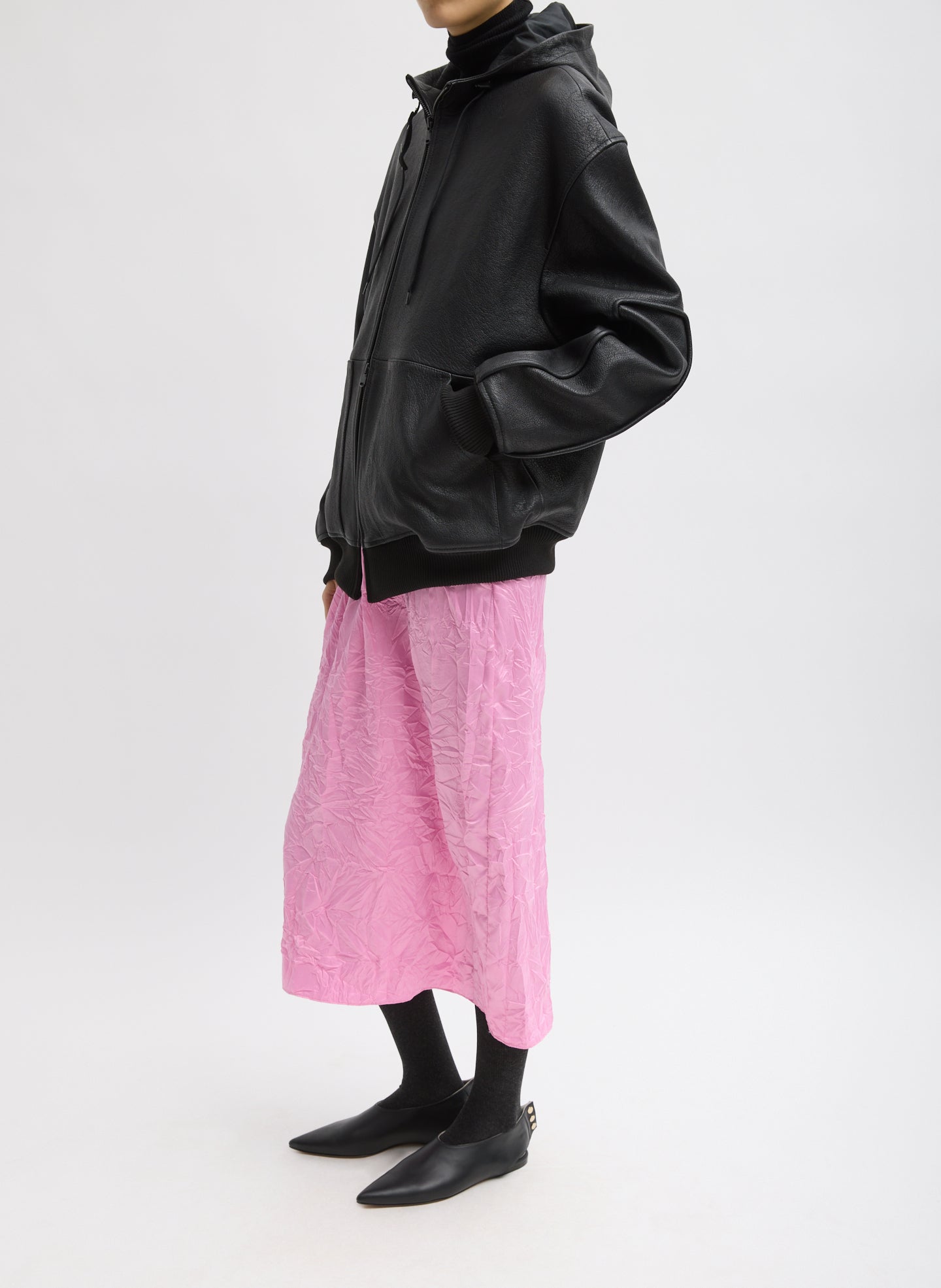 Black Pebbled Leather Zip Up Hoodie Jacket - full look, side view on model
