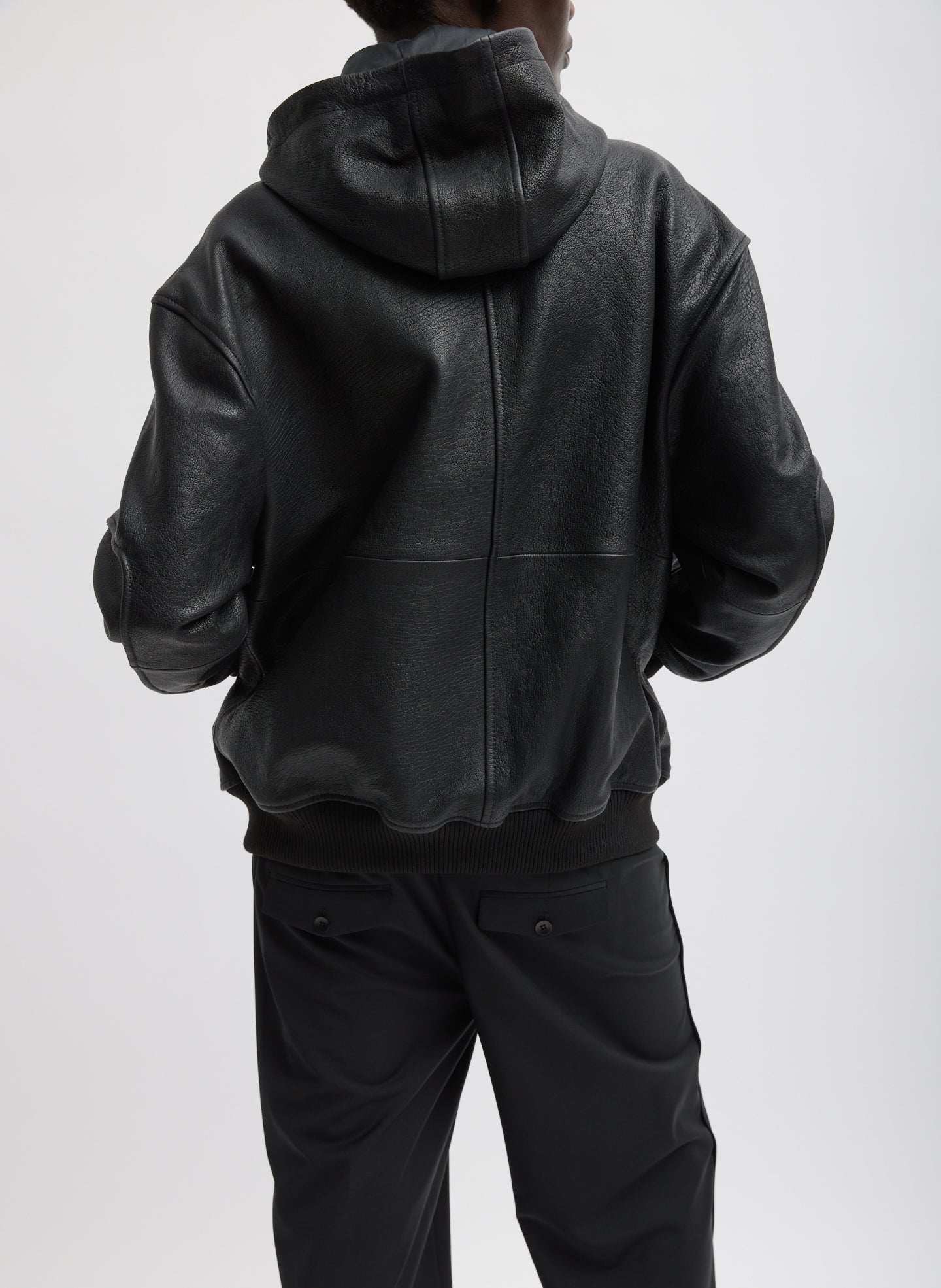Black Pebbled Leather Zip Up Hoodie Jacket - back view on model