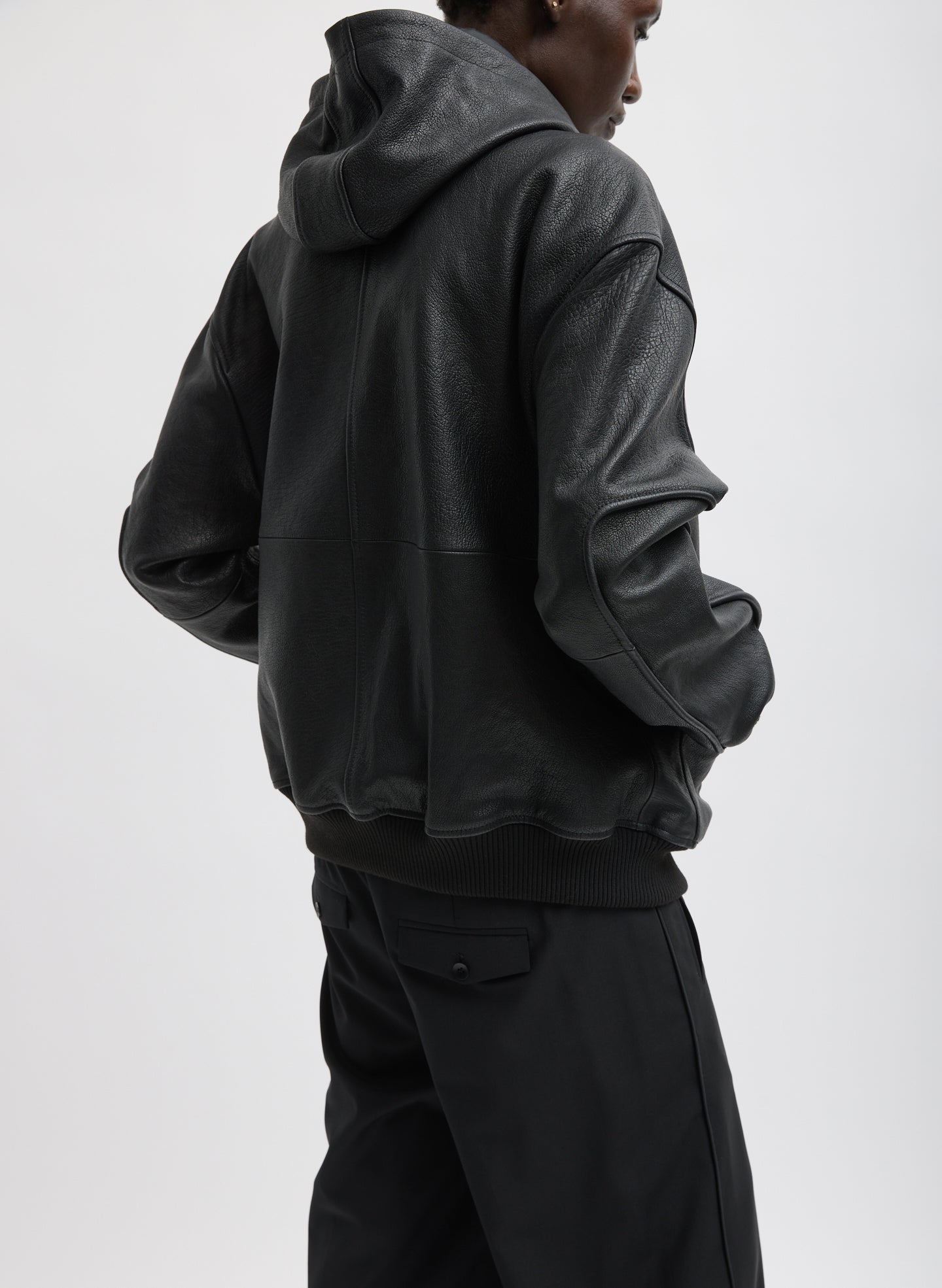 Black Pebbled Leather Zip Up Hoodie Jacket - back view on model
