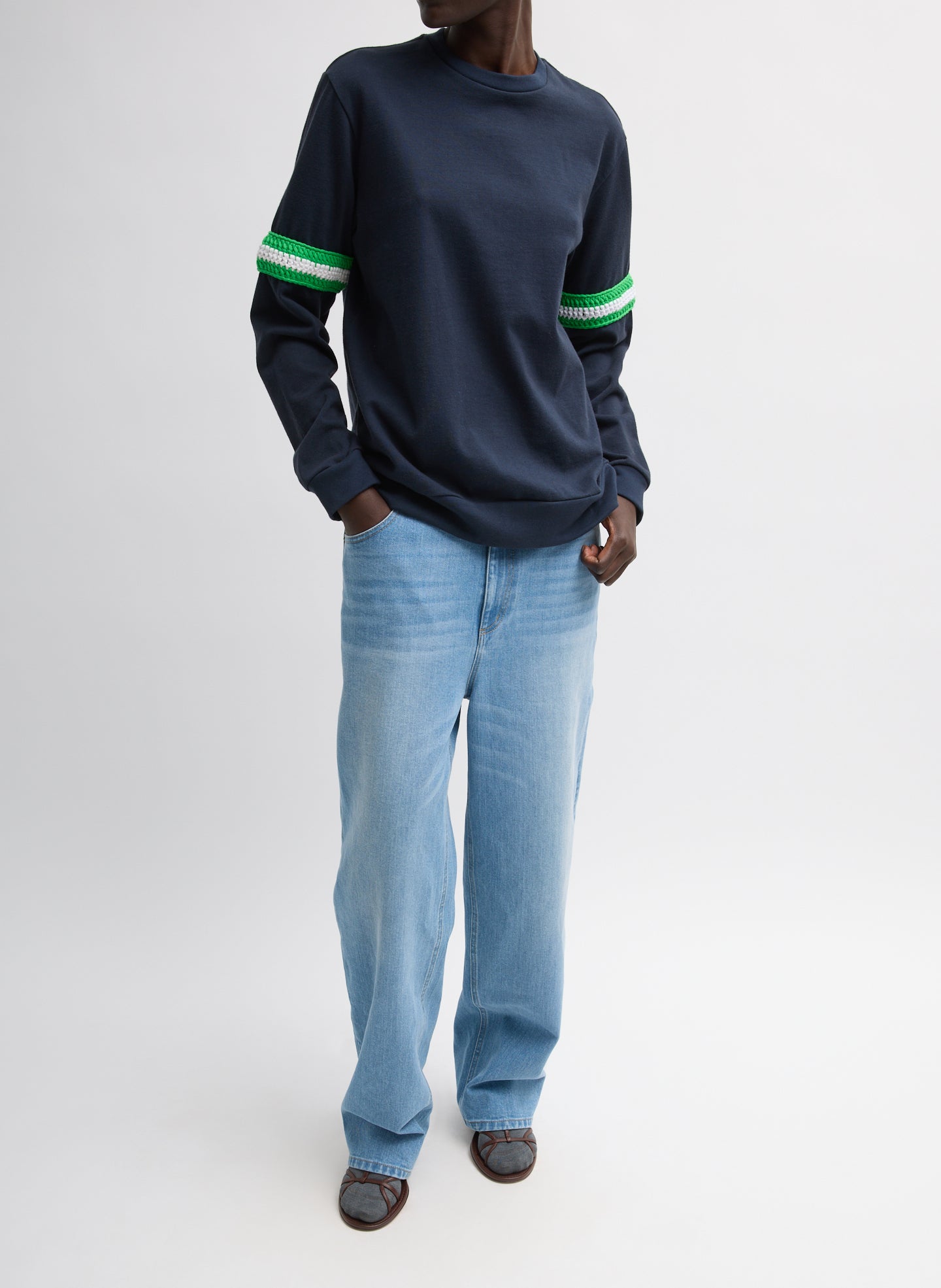 Navy Sport Knit Crewneck T-Shirt With Crochet Trim - green crochet trim, front view on model