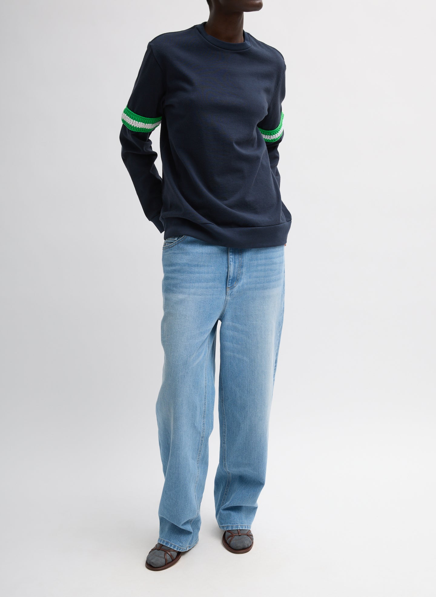 Navy Sport Knit Crewneck T-Shirt With Crochet Trim - green crochet trim, front view on model