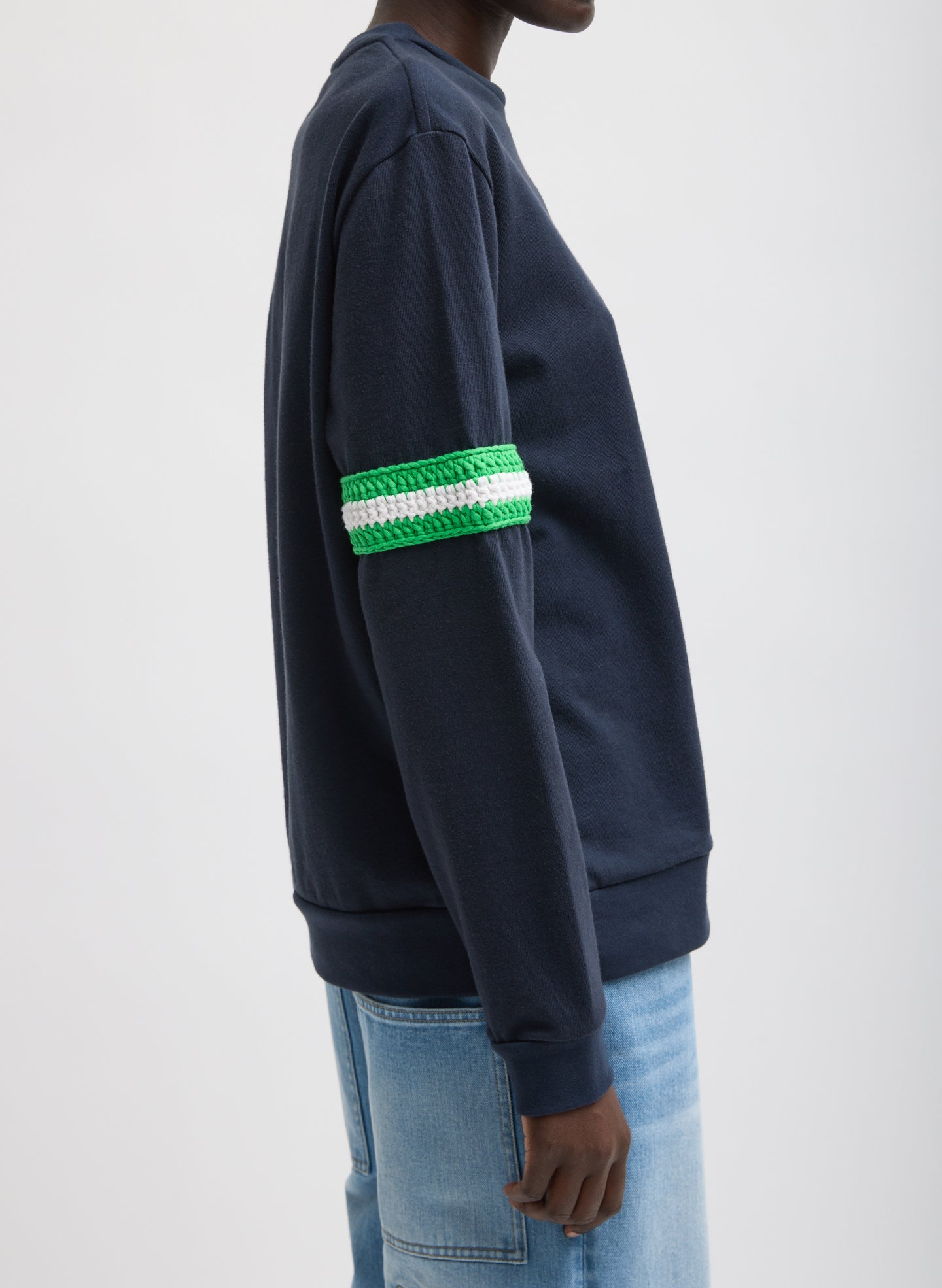 Navy Sport Knit Crewneck T-Shirt With Crochet Trim - green crochet trim, side view on model