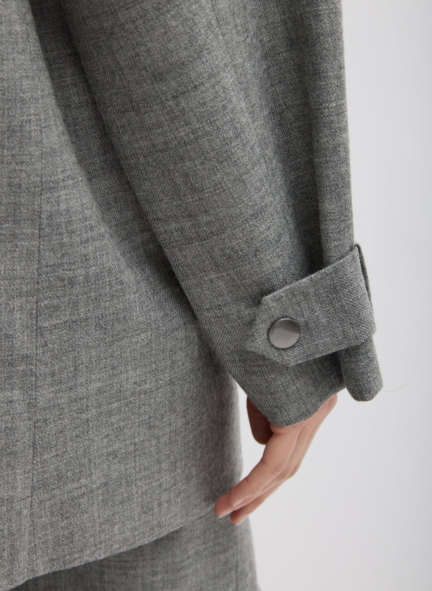 Grey Techy Bonded Wool Olivier Blazer - closeup of button detail at sleeve