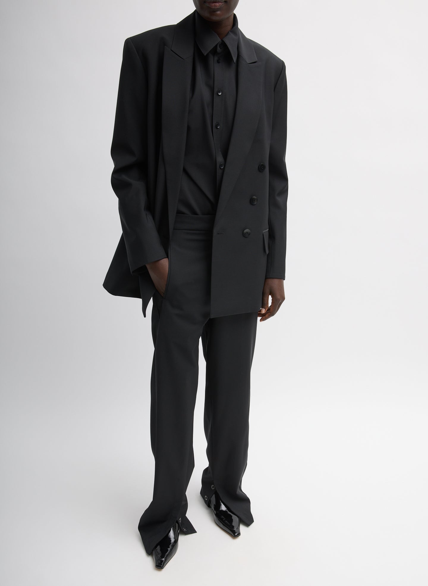 Black Recycled Tropical Wool Jules Trouser - snap hem, full look, front view on model