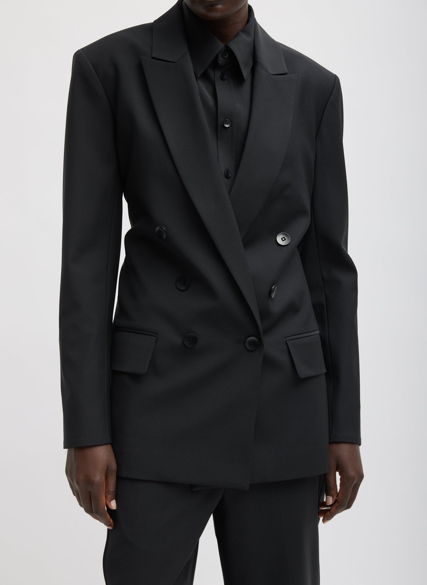 Black Recycled Tropical Wool Blazer With Back Belt - double breasted, front view on model
