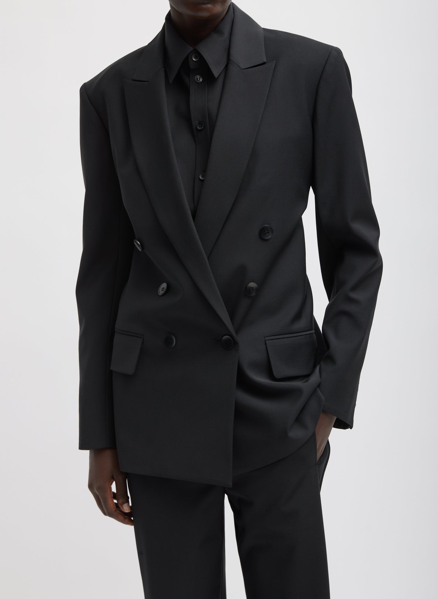 Black Recycled Tropical Wool Blazer With Back Belt - double breasted, front view on model