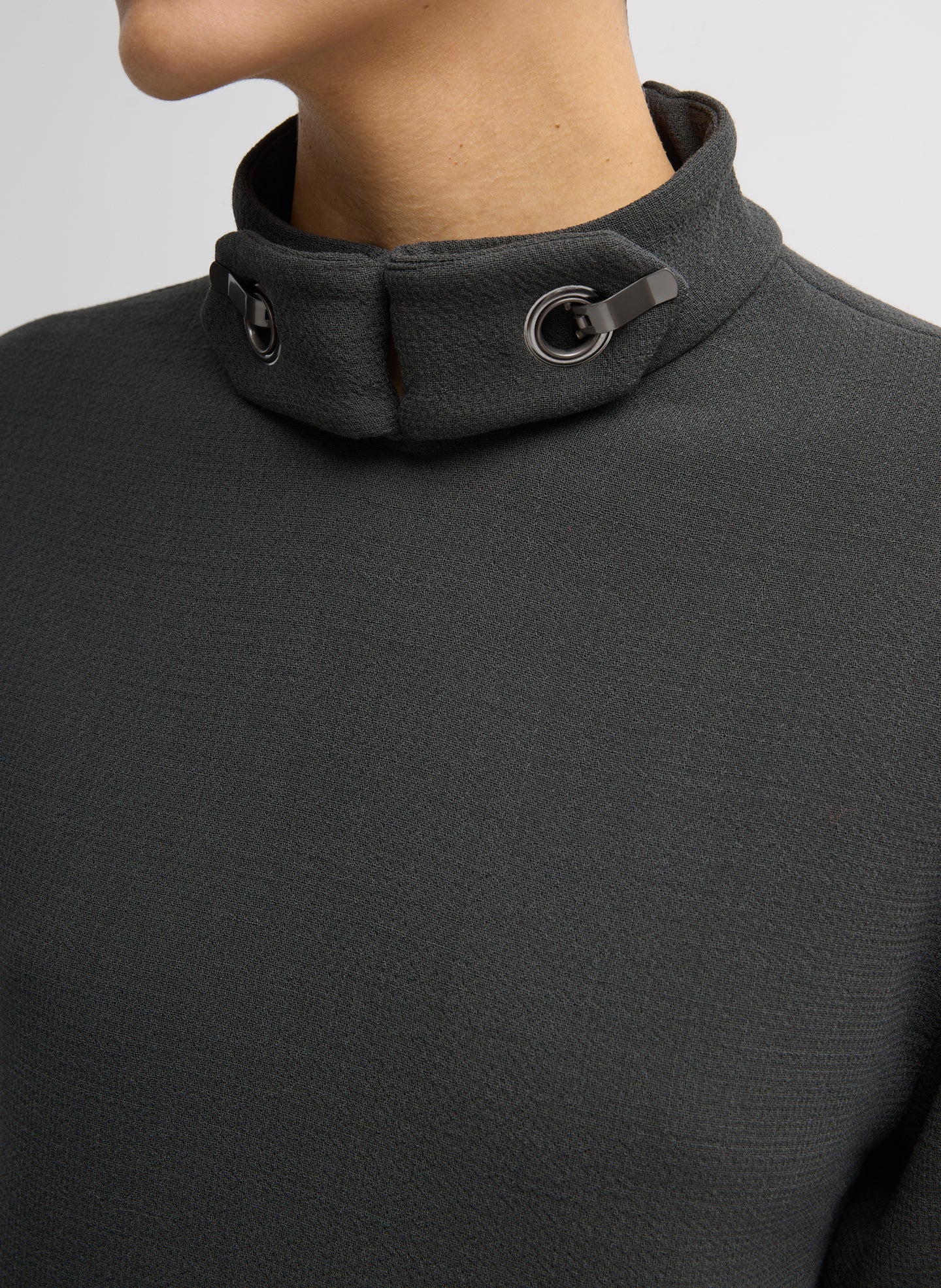 Dark Grey Wool Crepe Fontaine Tunic Top - closeup on metal clasps at neckline