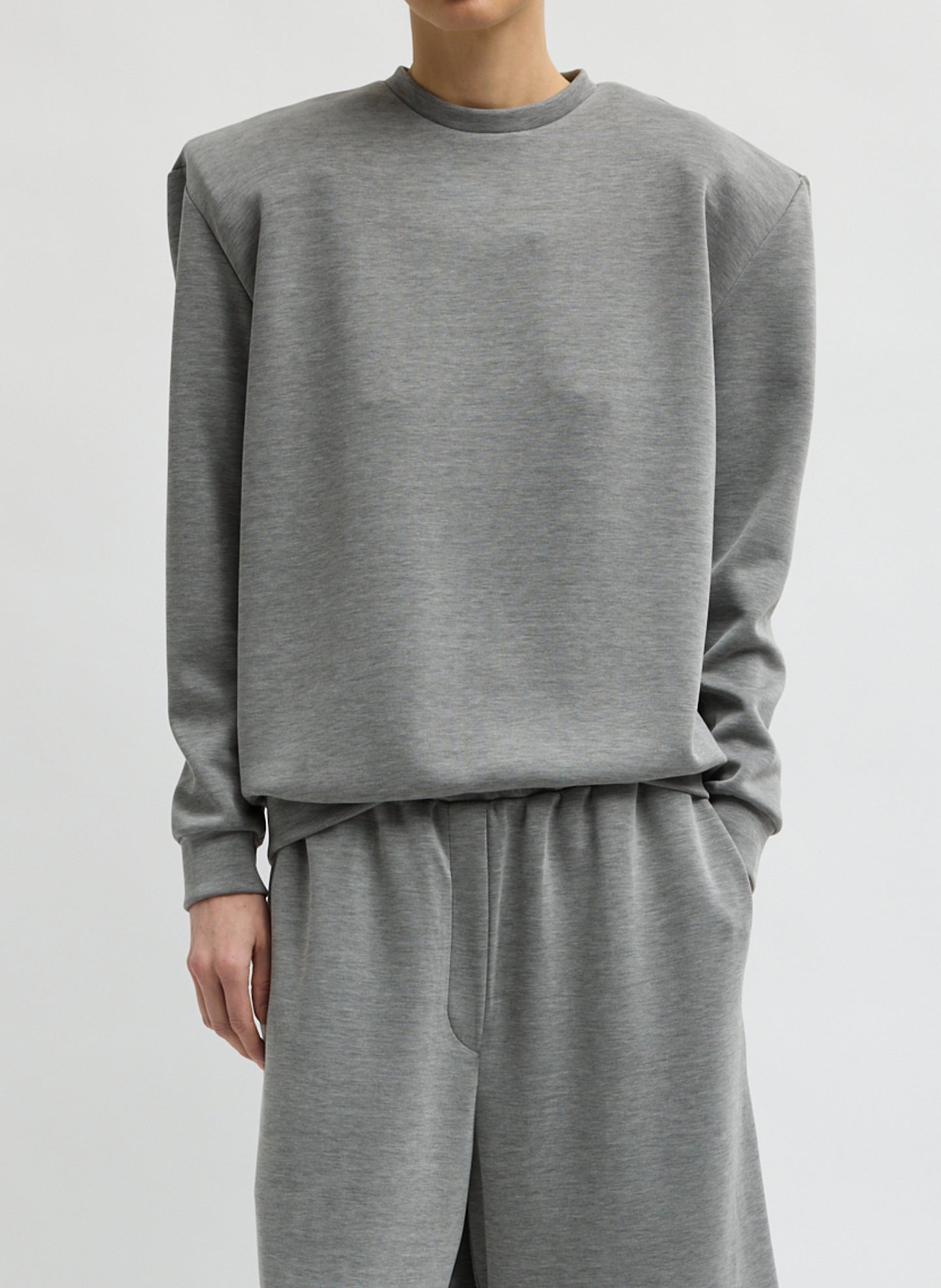 Grey Feather Weight Viscose Removable Shoulder Pad Long Sleeve T-Shirt - front view on model