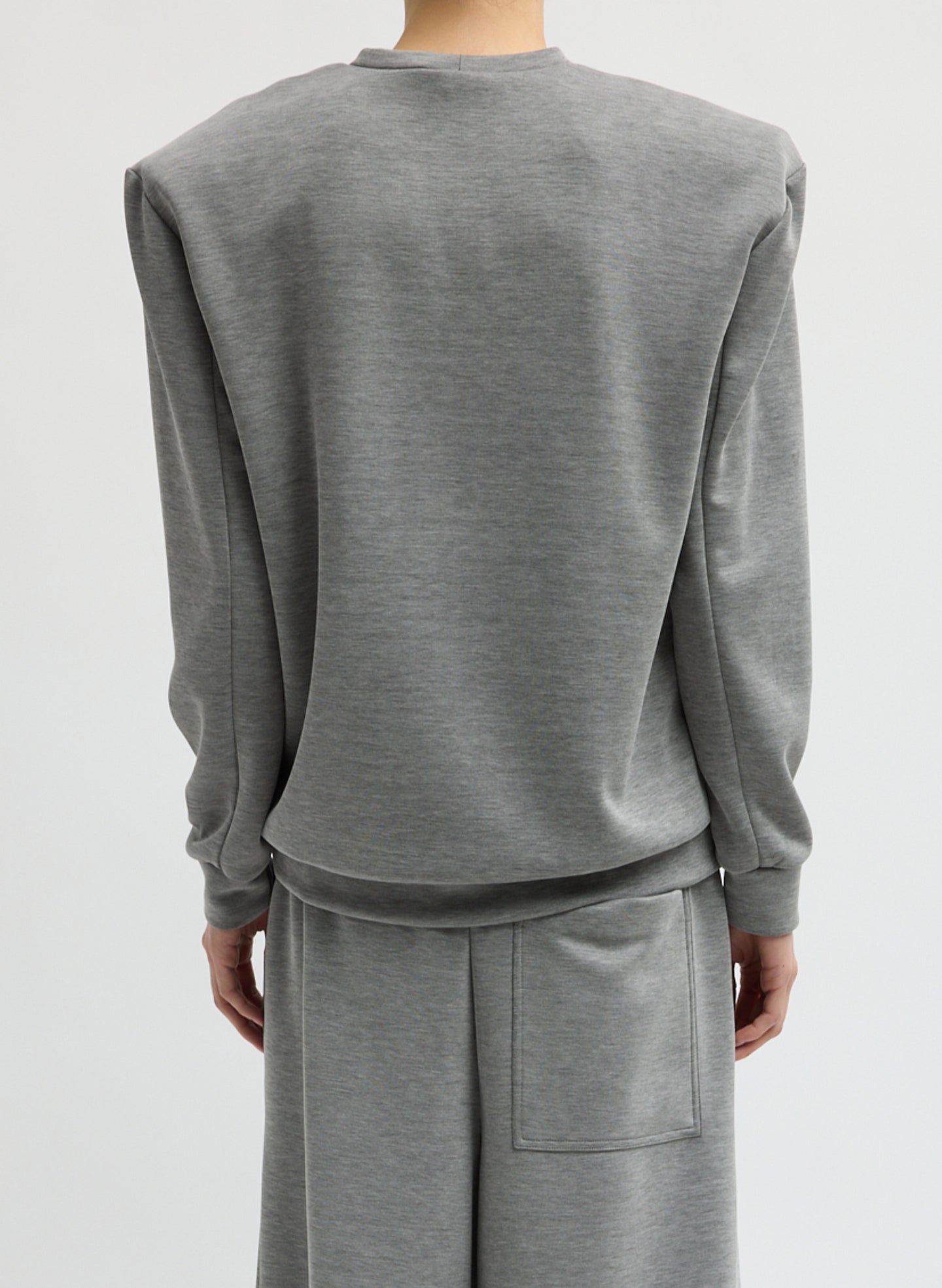 Grey Feather Weight Viscose Removable Shoulder Pad Long Sleeve T-Shirt - back view on model