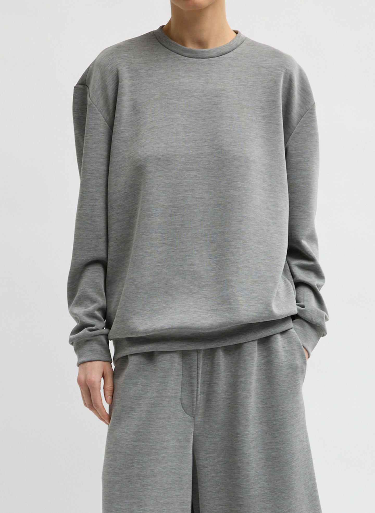 Grey Feather Weight Viscose Removable Shoulder Pad Long Sleeve T-Shirt - front view on model