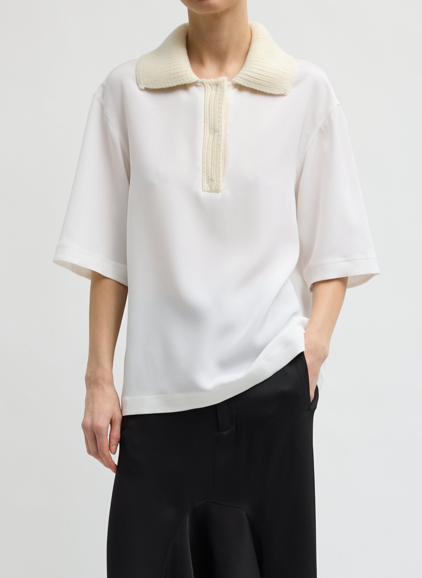 Ivory Stretch Silk Nylon CDC Knit Collar Cocoon Top - short sleeve collared top, front view on model