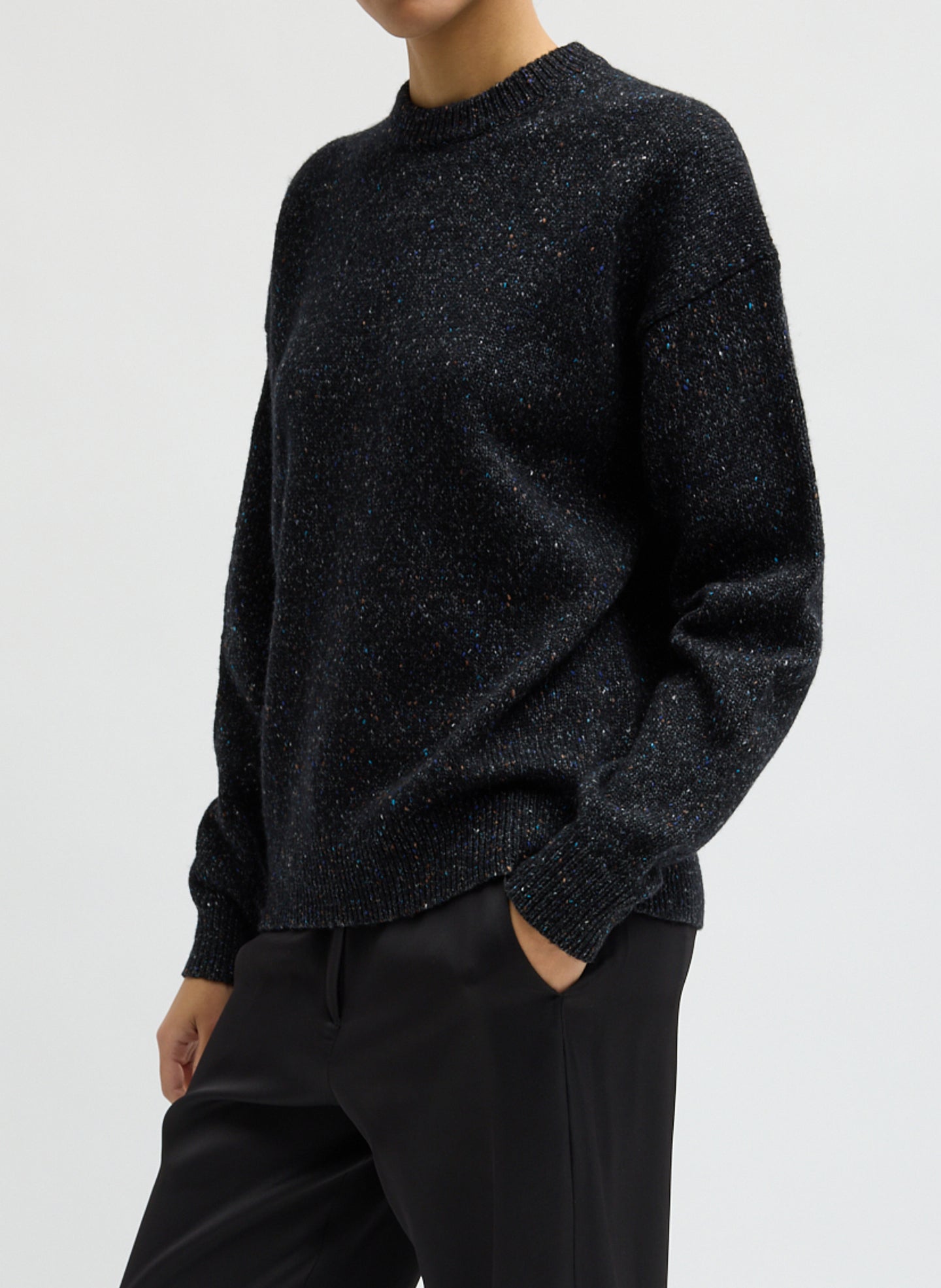 Black Multi Speckled Tweed Crewneck Sweater - front view on model