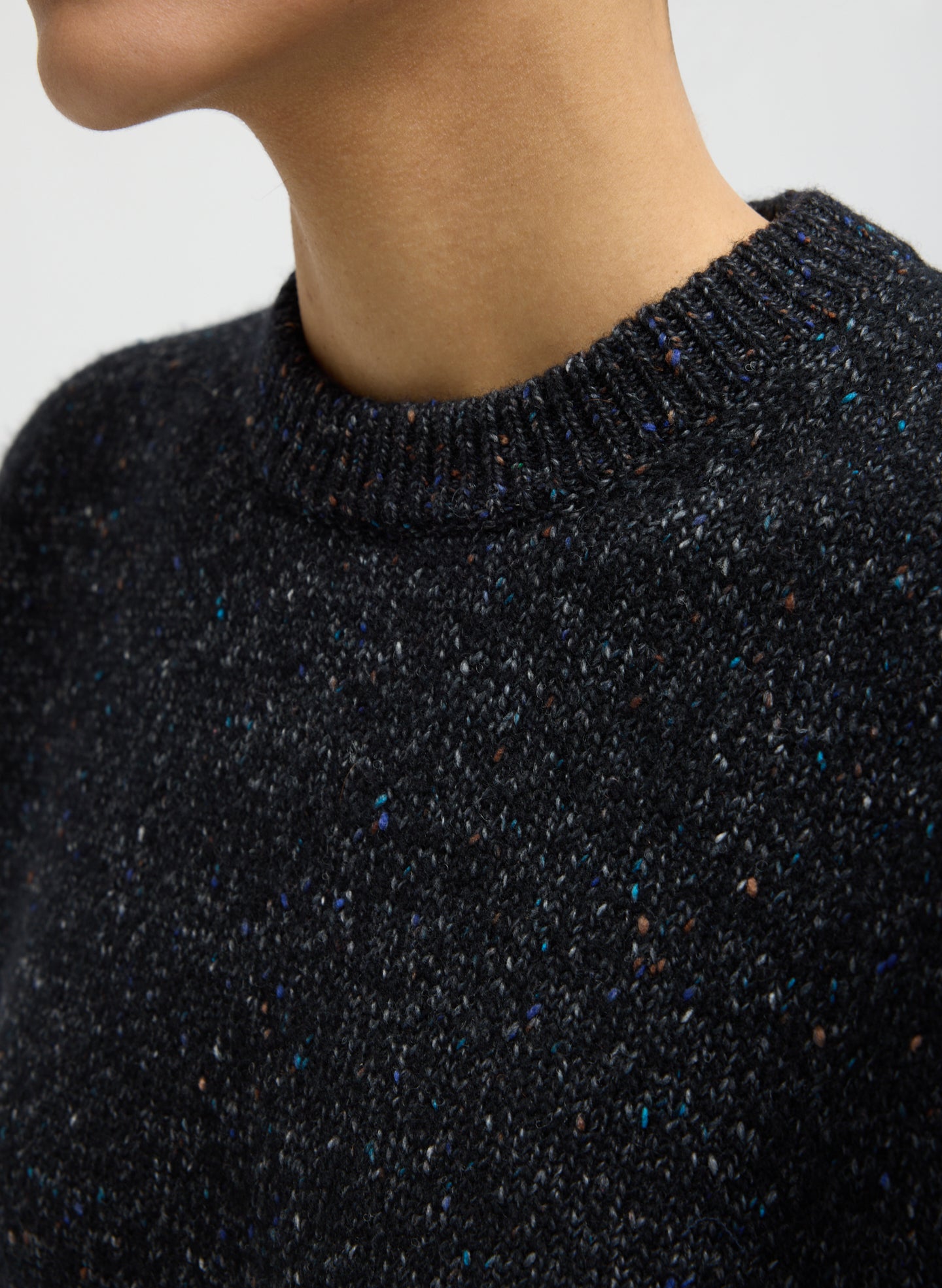 Black Multi Speckled Tweed Crewneck Sweater - closeup of neckline