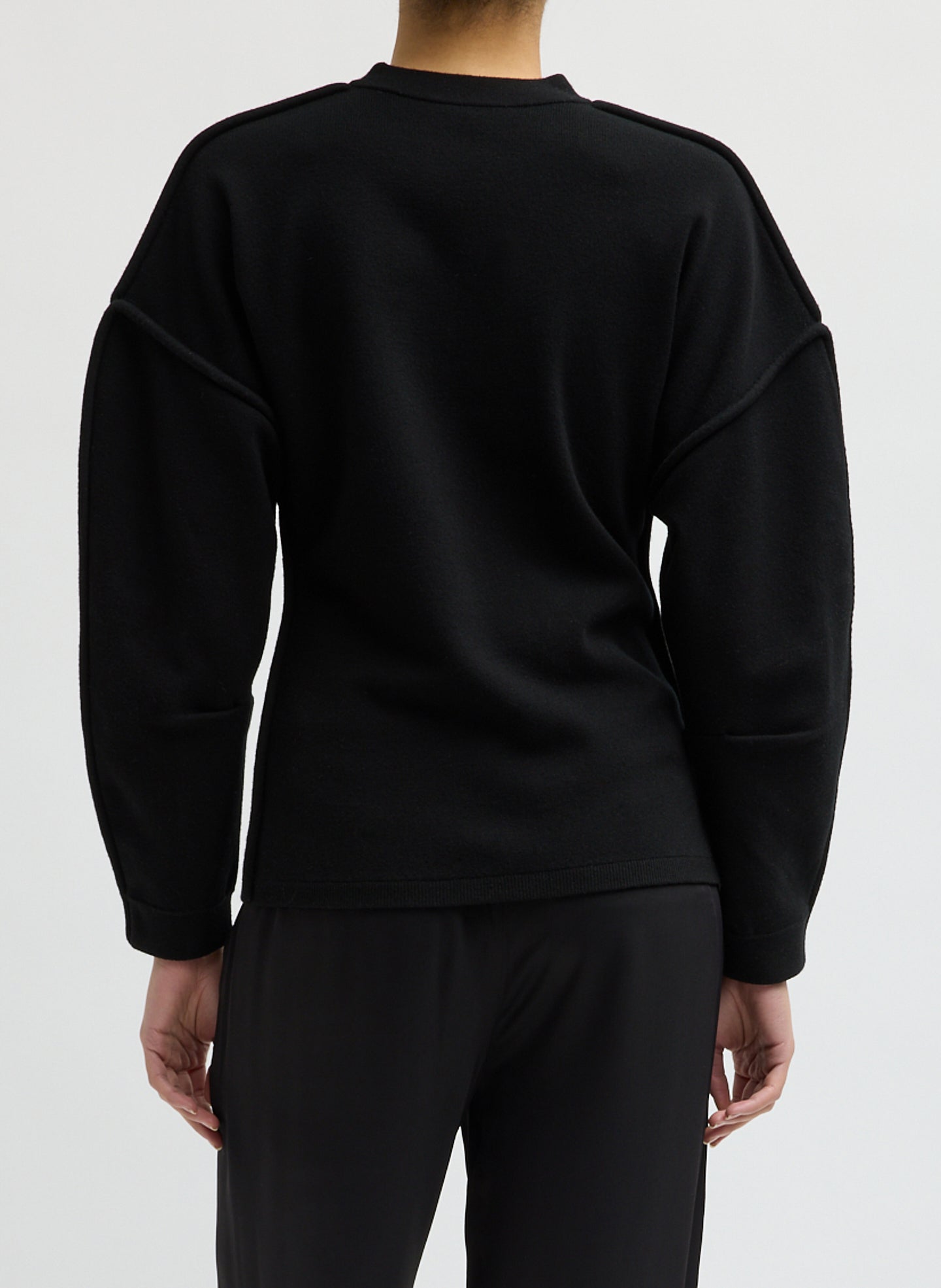 Black Sculpted Wool Fitted Sweater - back view on model