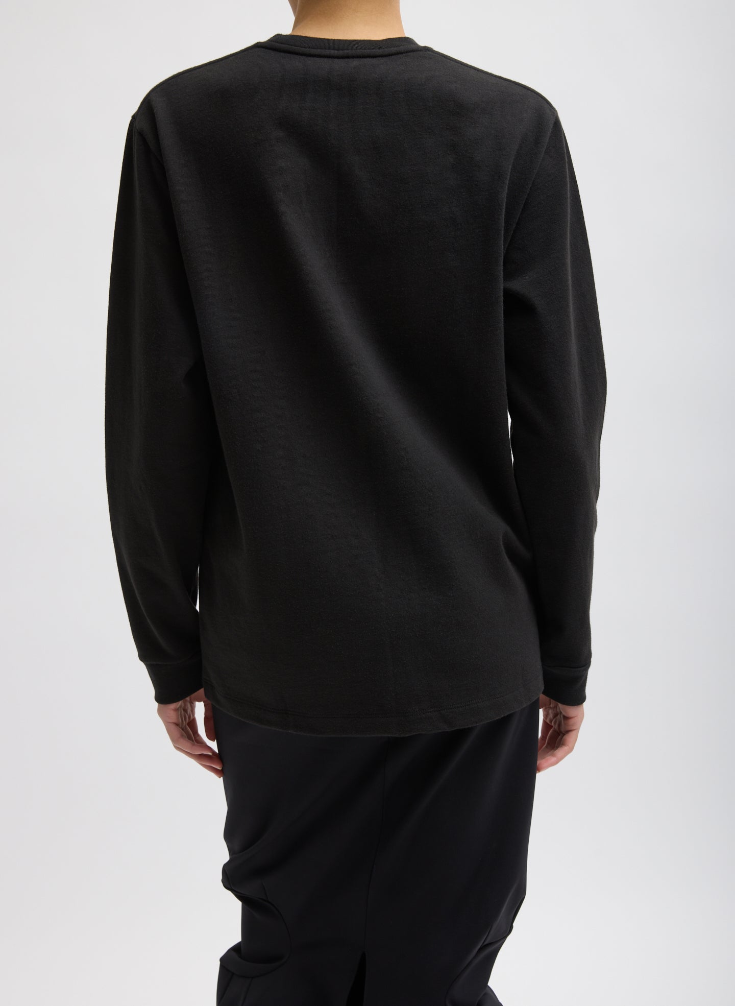 Black Perfect Unisex Long Sleeve T-Shirt "Untitled" - graphic t-shirt, back view on model