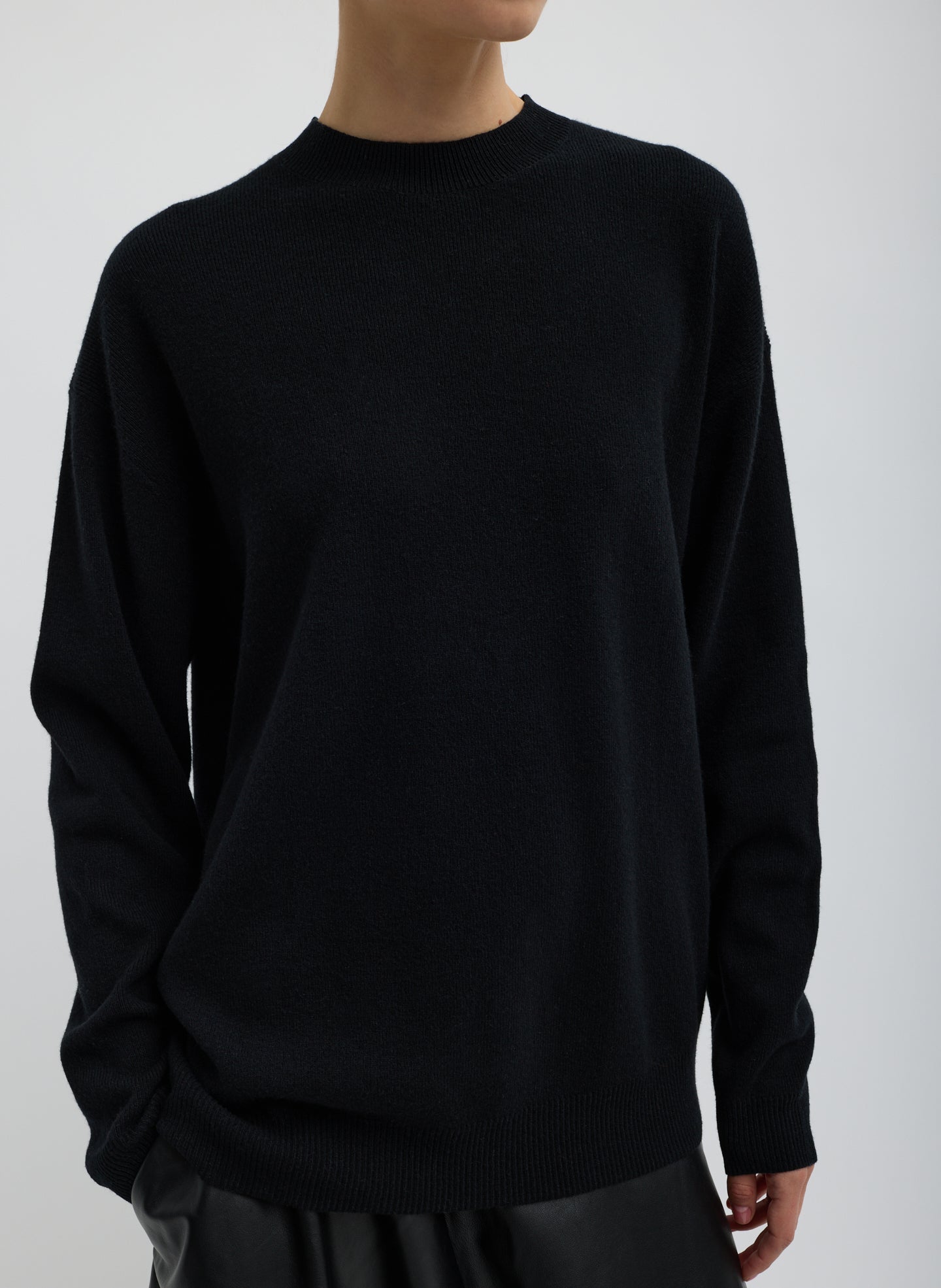 Black Anna Merino Wool Cut Out Racerback Pullover - crewneck sweater, front view on model