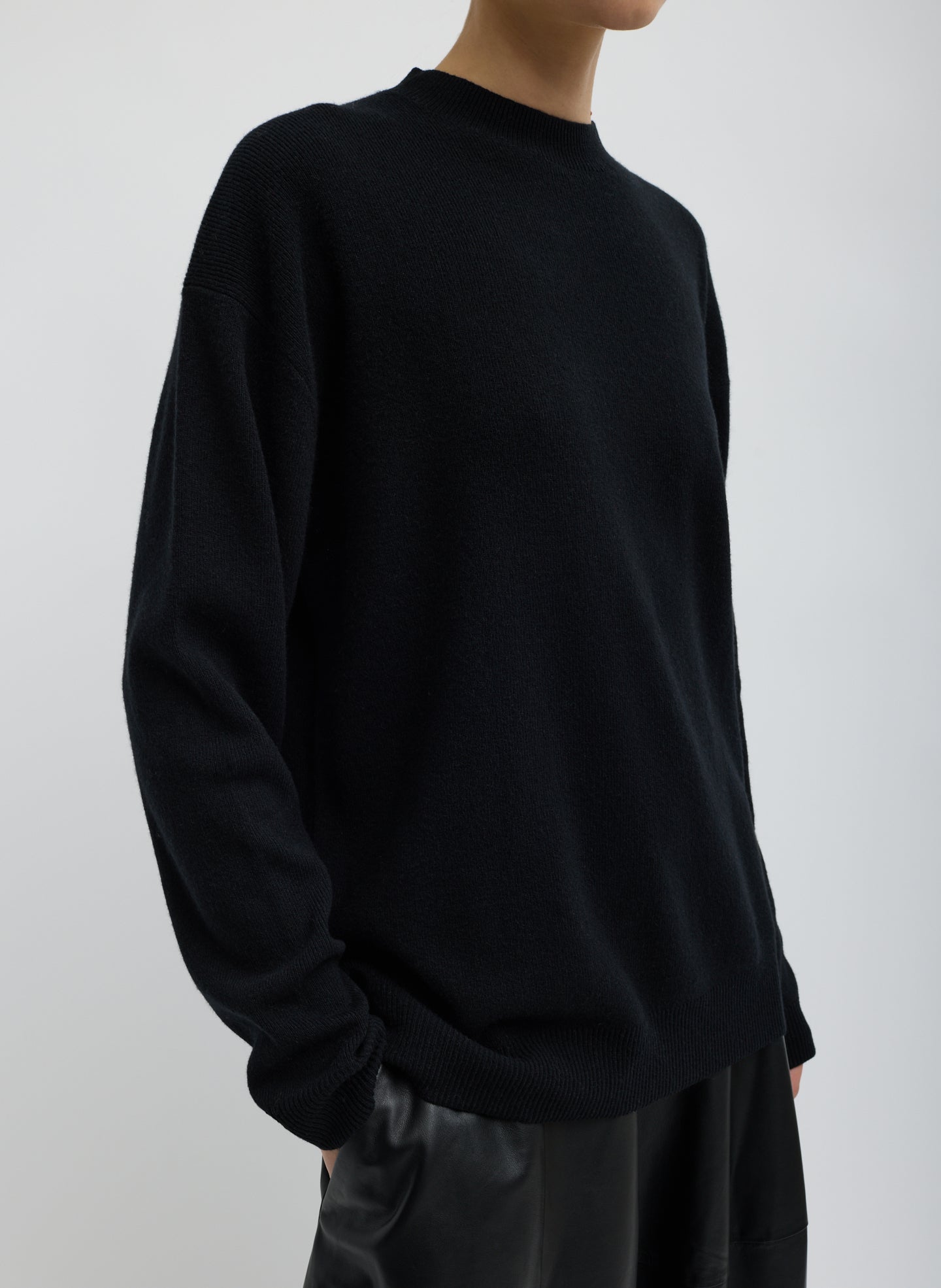 Black Anna Merino Wool Cut Out Racerback Pullover - crewneck sweater, side view on model