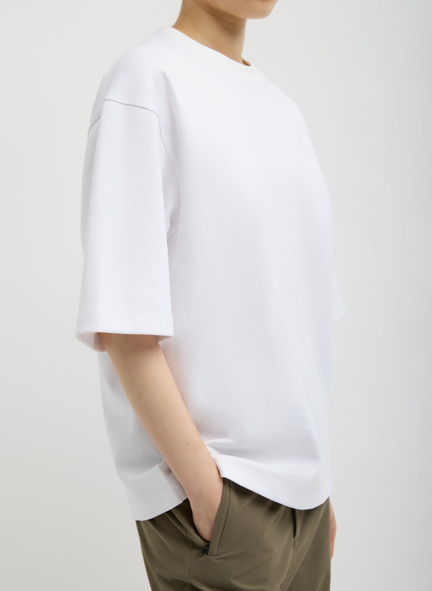 White Active Knit Easy T-Shirt - oversized tee, side view on model