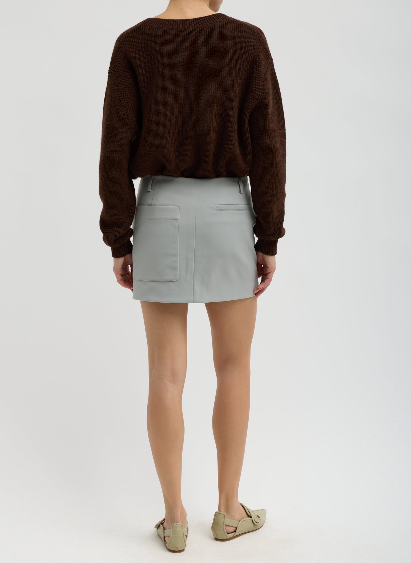 Light Grey Compact Tech Knit Mini Skirt - full look, back view on model