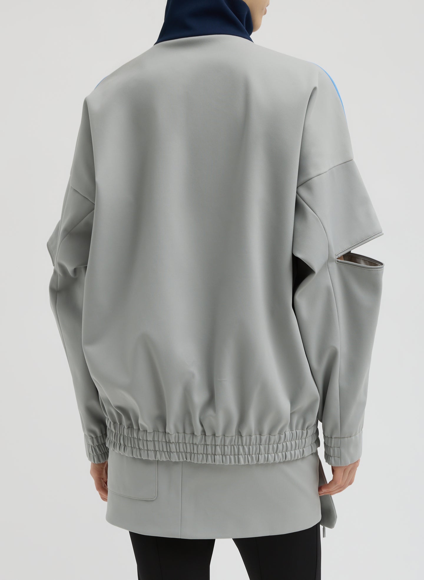 Grey Color Blocked Compact Tech Knit Bomber - back view on model