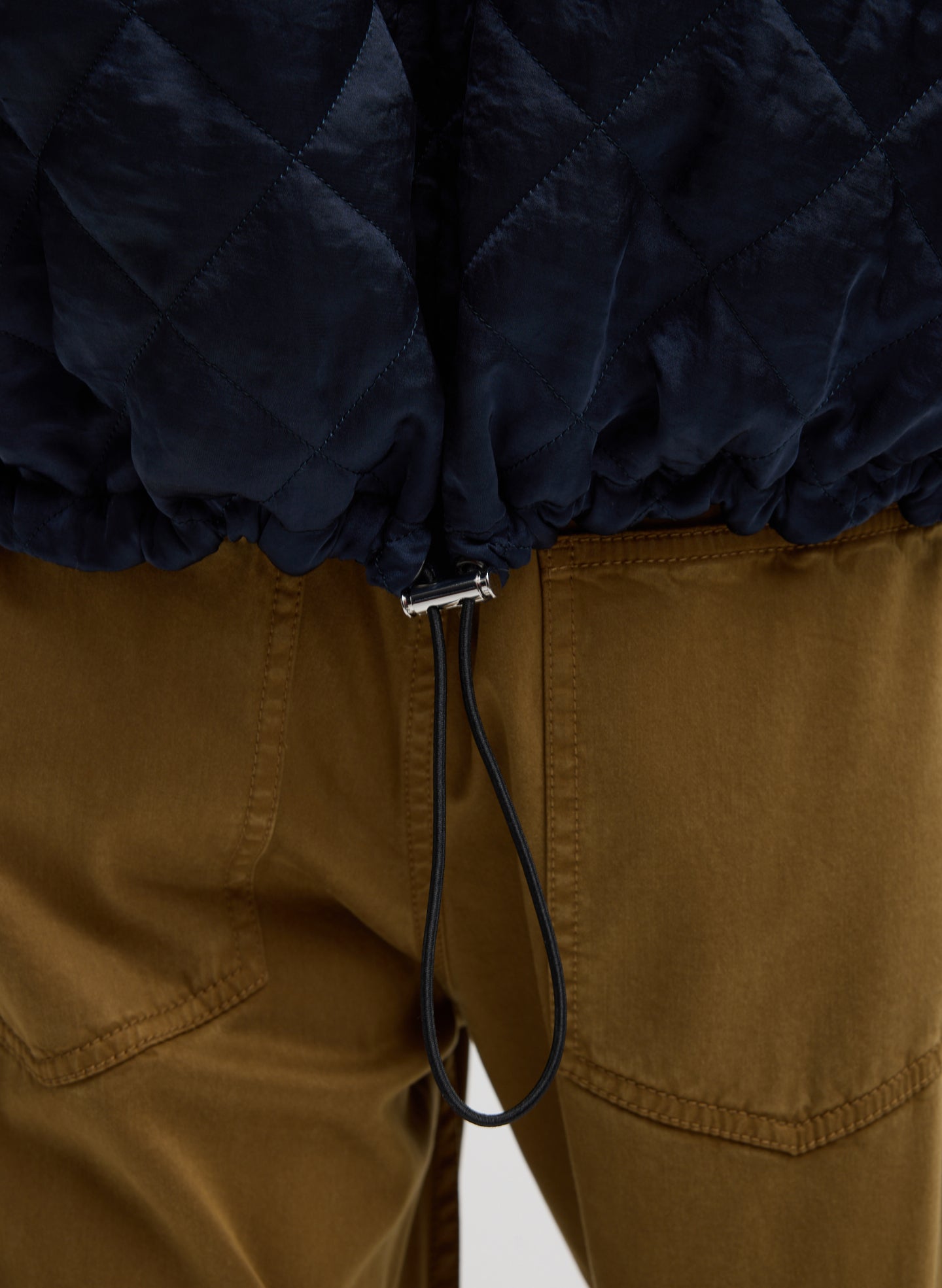 Navy Cozy Quilting Anorak T-Shirt - closeup of drawstring detail at hem