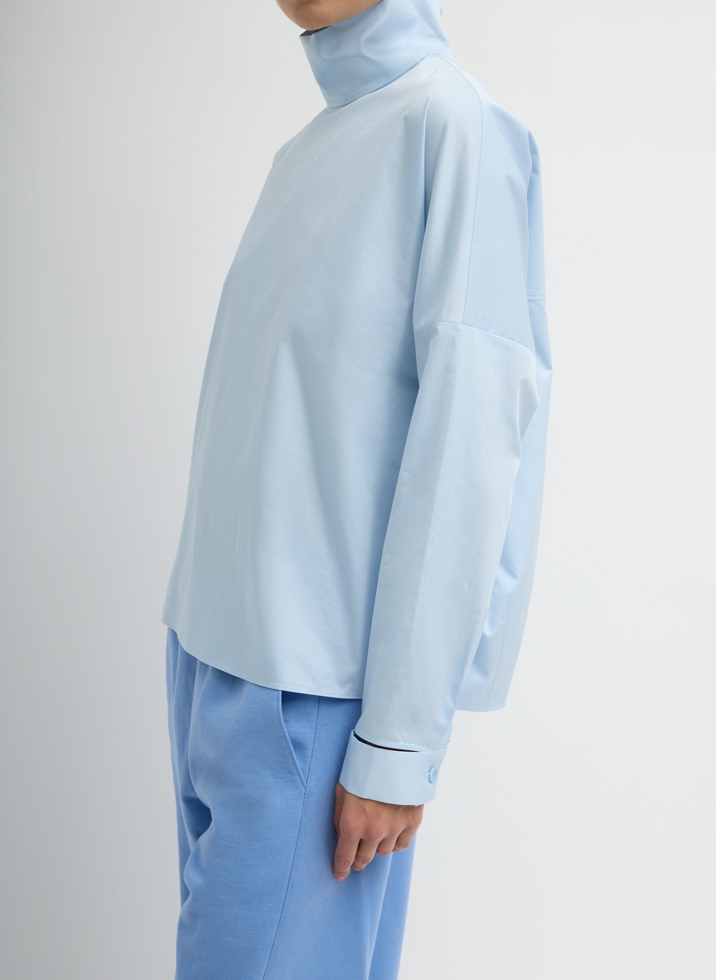 Chambray Blue Eco Poplin Funnel Neck Dolman Top - long sleeve top, side view on model