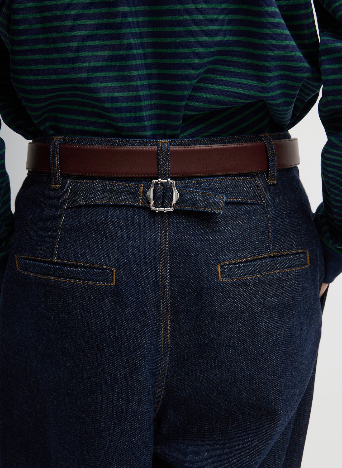Indigo Denim Triple Pleat Jean - closeup of back pockets and belt detail
