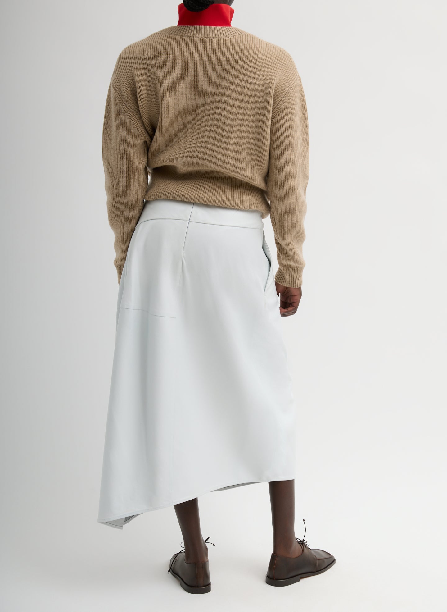 Optic White Leather Asymmetrical Balloon Skirt - leather midi skirt, back view on model