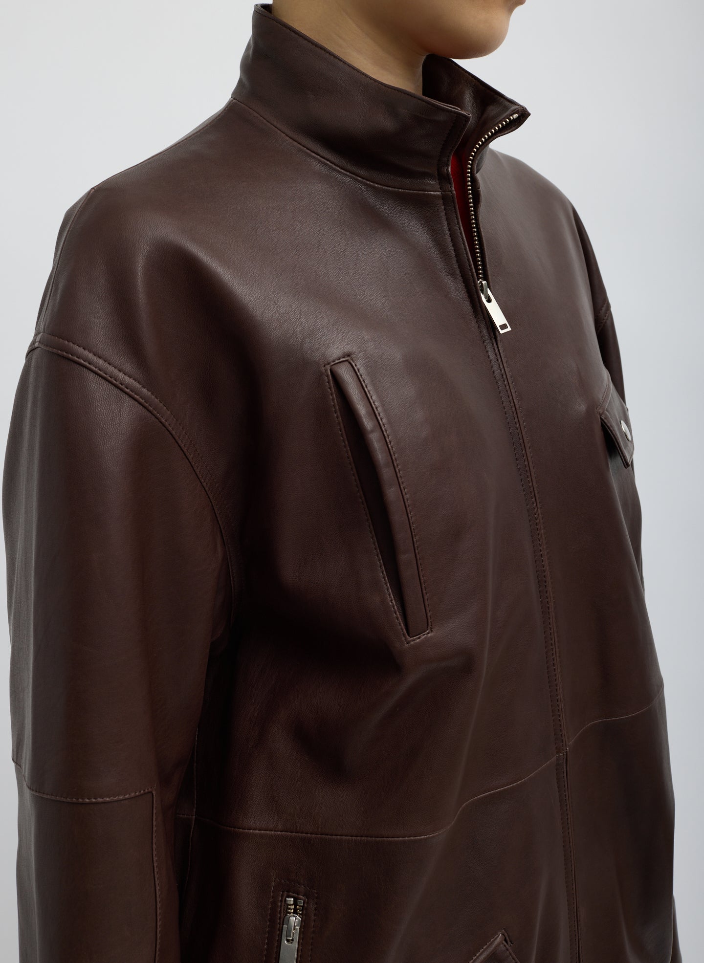 Brown Leather Moto Bomber - closeup of front pockets and zip details