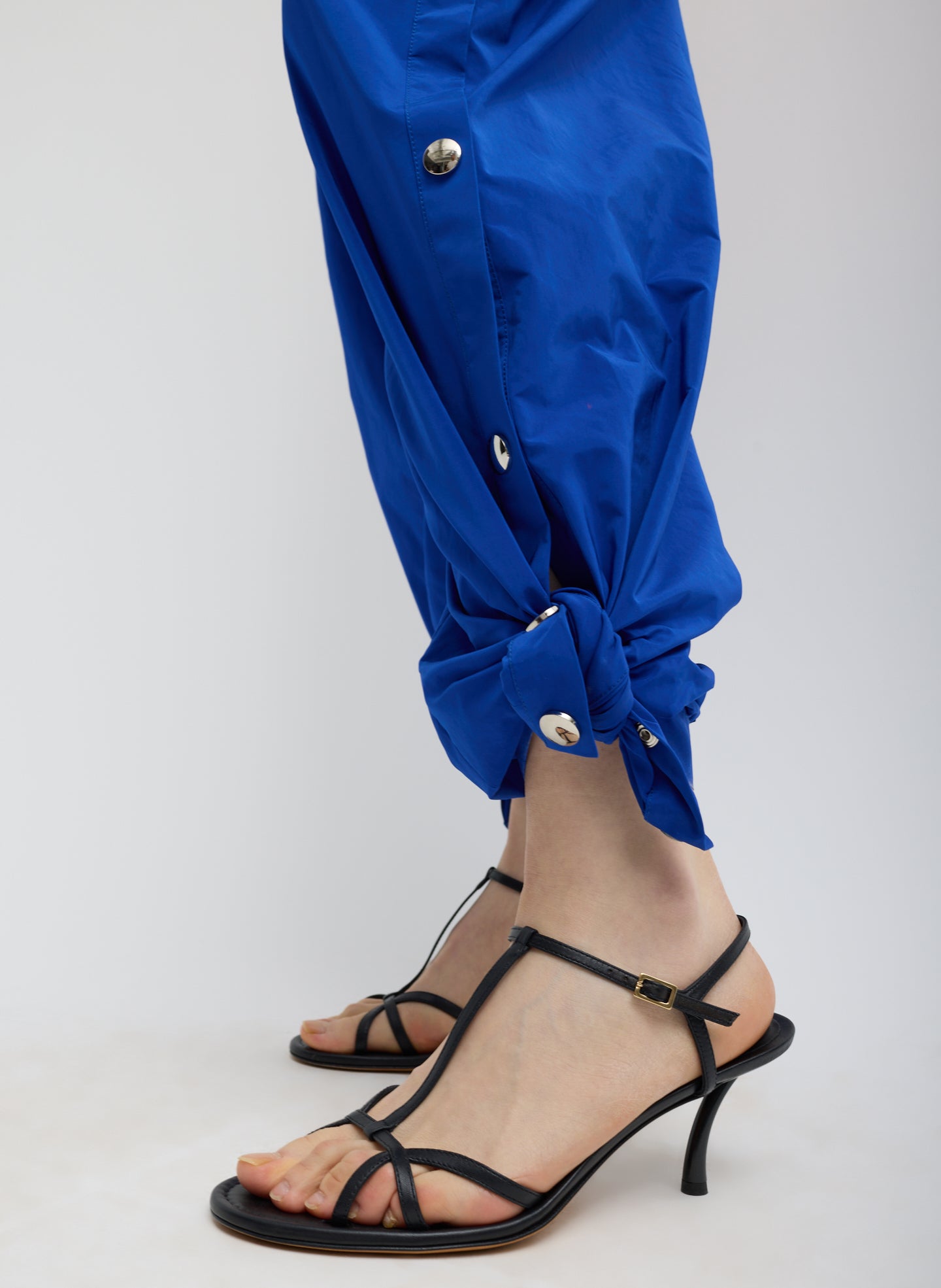 Bright Blue Nylon Snap Pull On Jogger - closeup of tied hem detail
