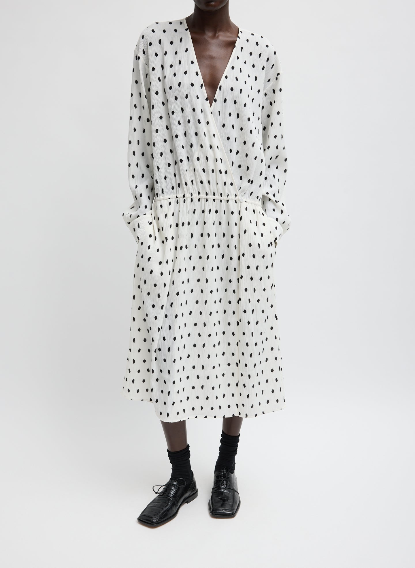 Black and White Scribble Dot Print Strech Plisse Wrap Dress - long sleeve midi dress, front view on model