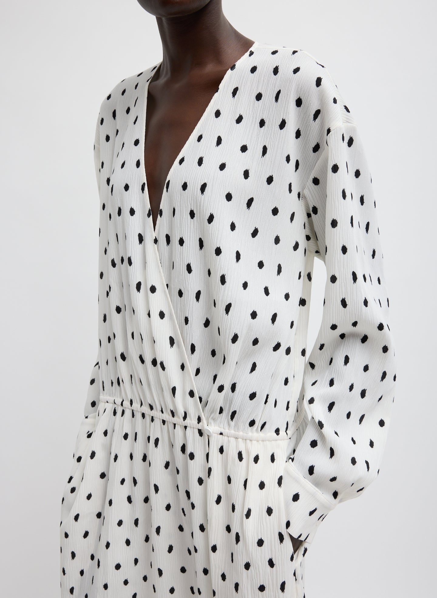 Black and White Scribble Dot Print Strech Plisse Wrap Dress - closeup of patterned plisse fabric