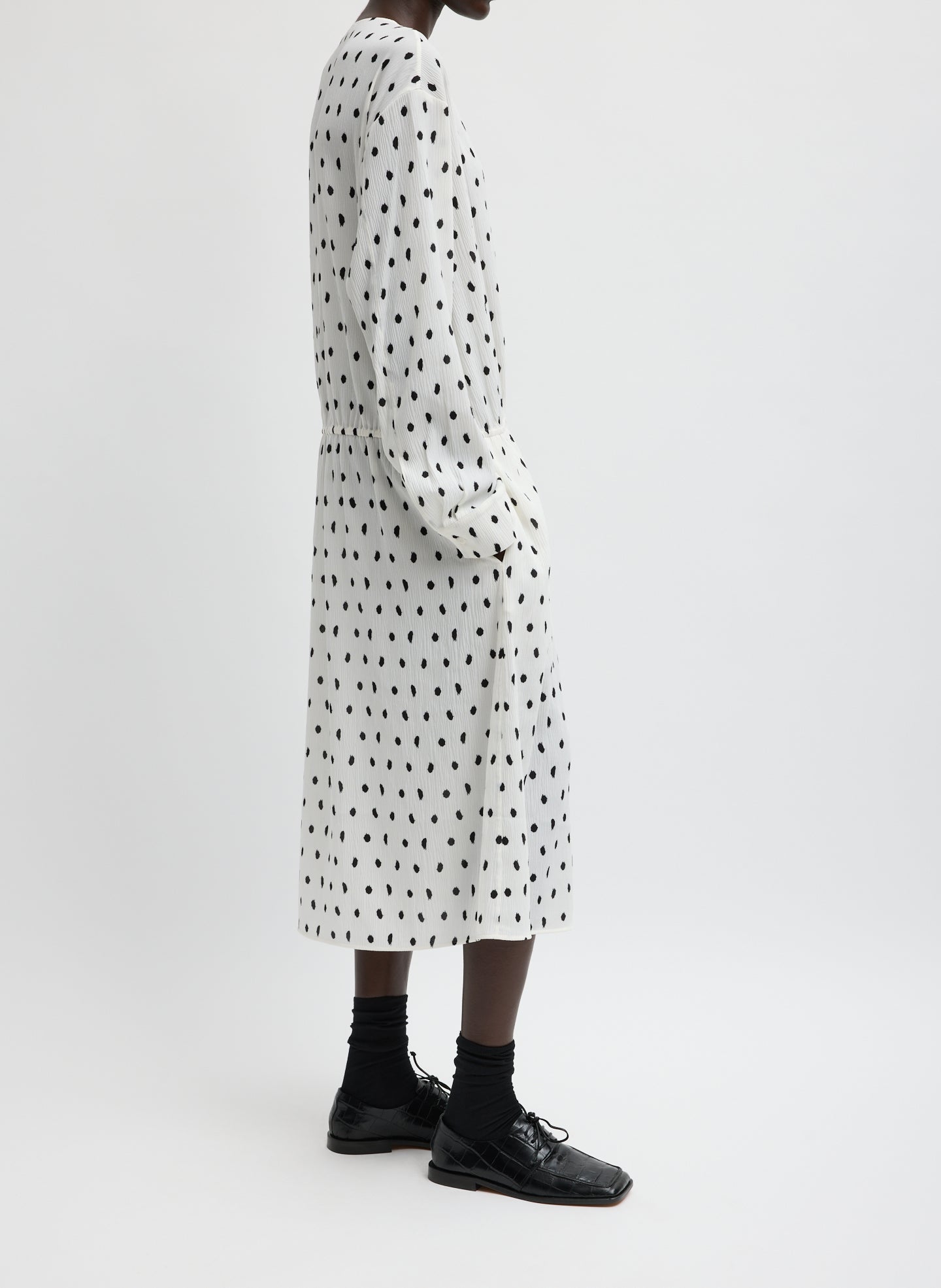 Black and White Scribble Dot Print Strech Plisse Wrap Dress - long sleeve midi dress, side view on model