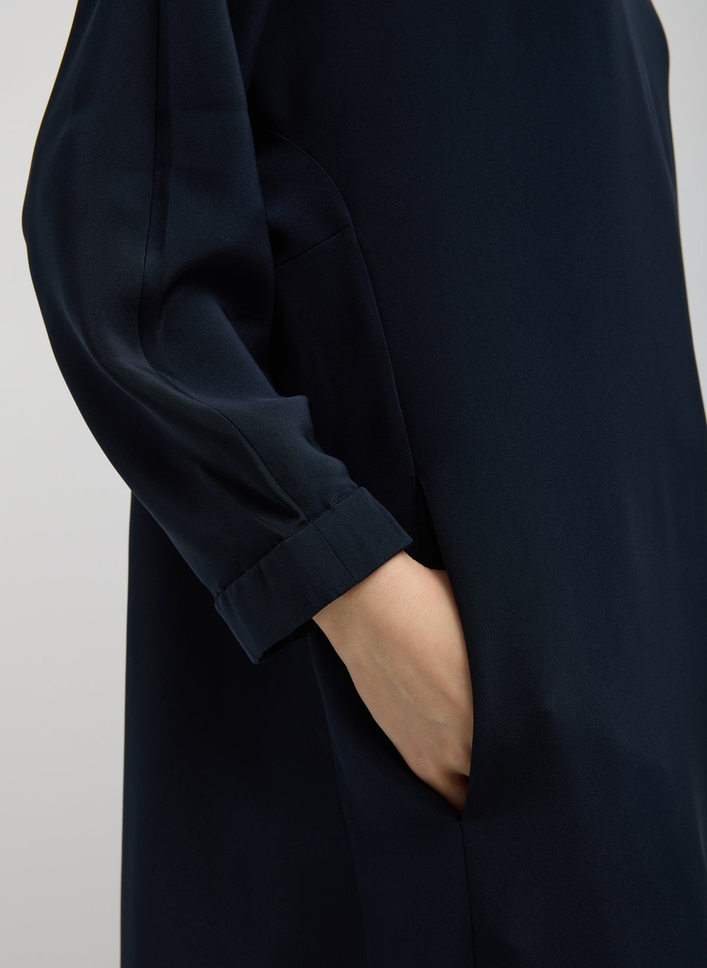 Dark Navy 4-Ply Silk Long Sleeve Cocoon Dress - closeup of side pocket detail