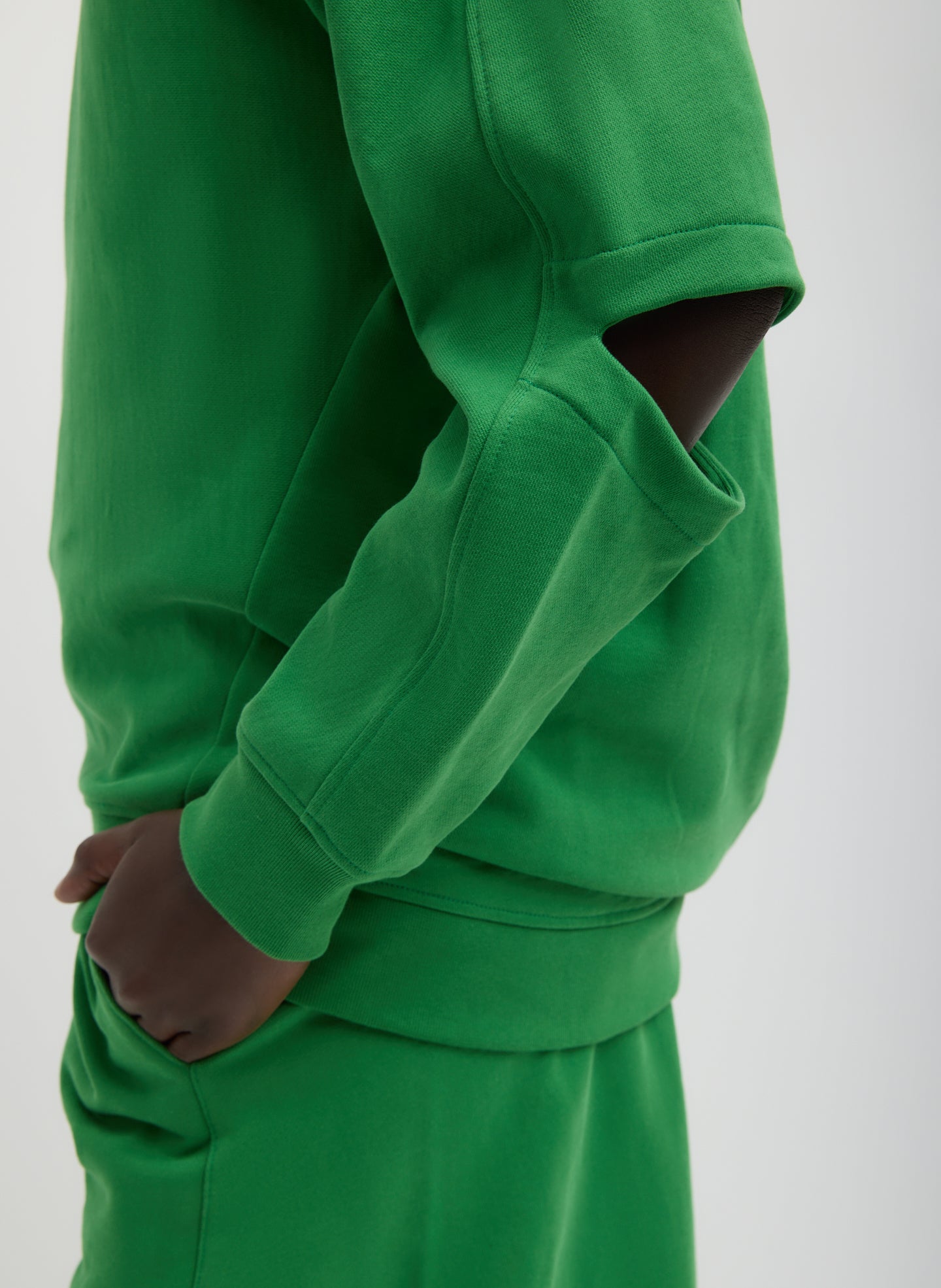 Green Cocoon Crewneck Sweatshirt - closeup of cutout detail at elbow