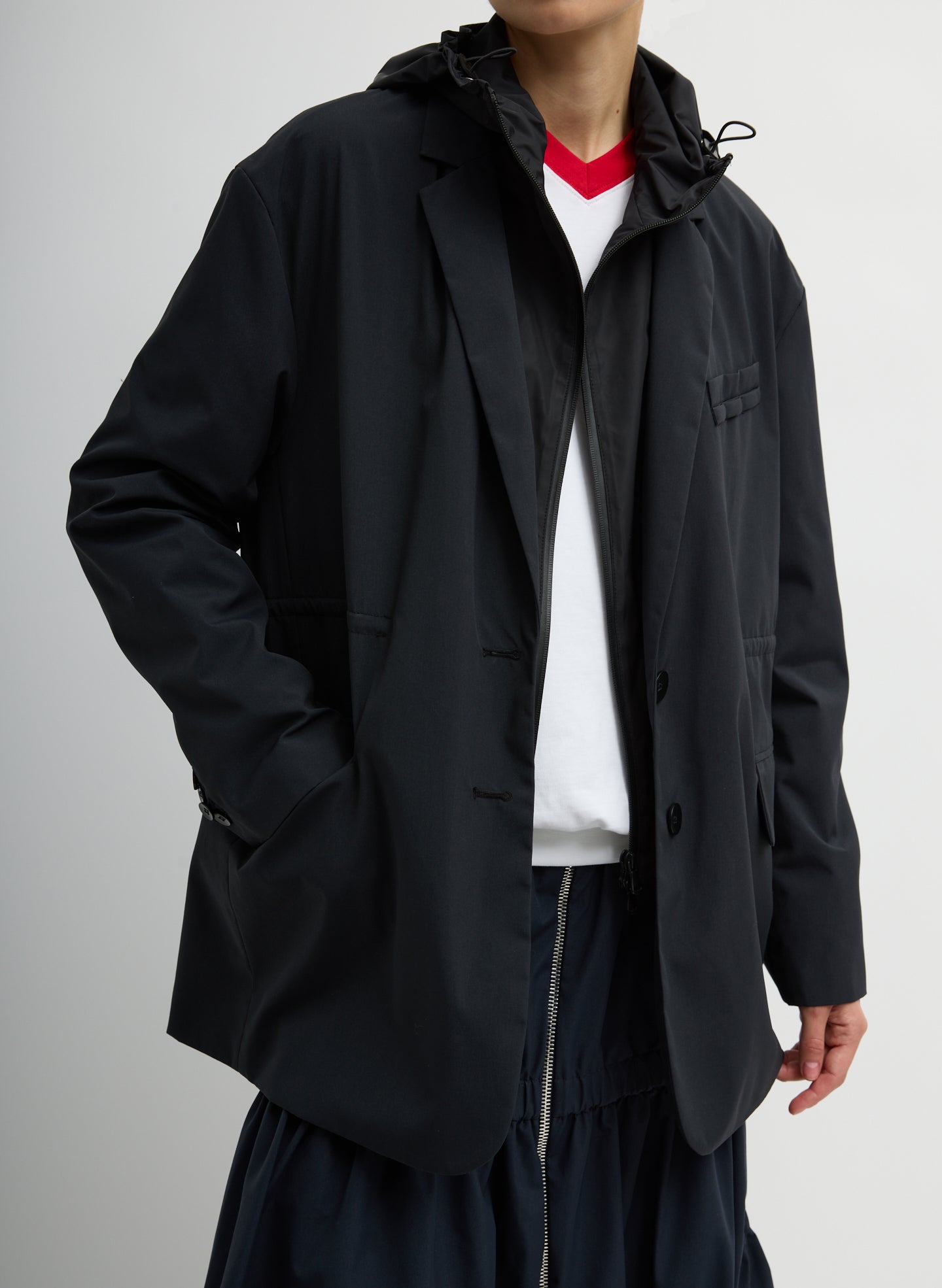 Black Tech Suiting Anorak Blazer With Zip Off Vest - front view on model