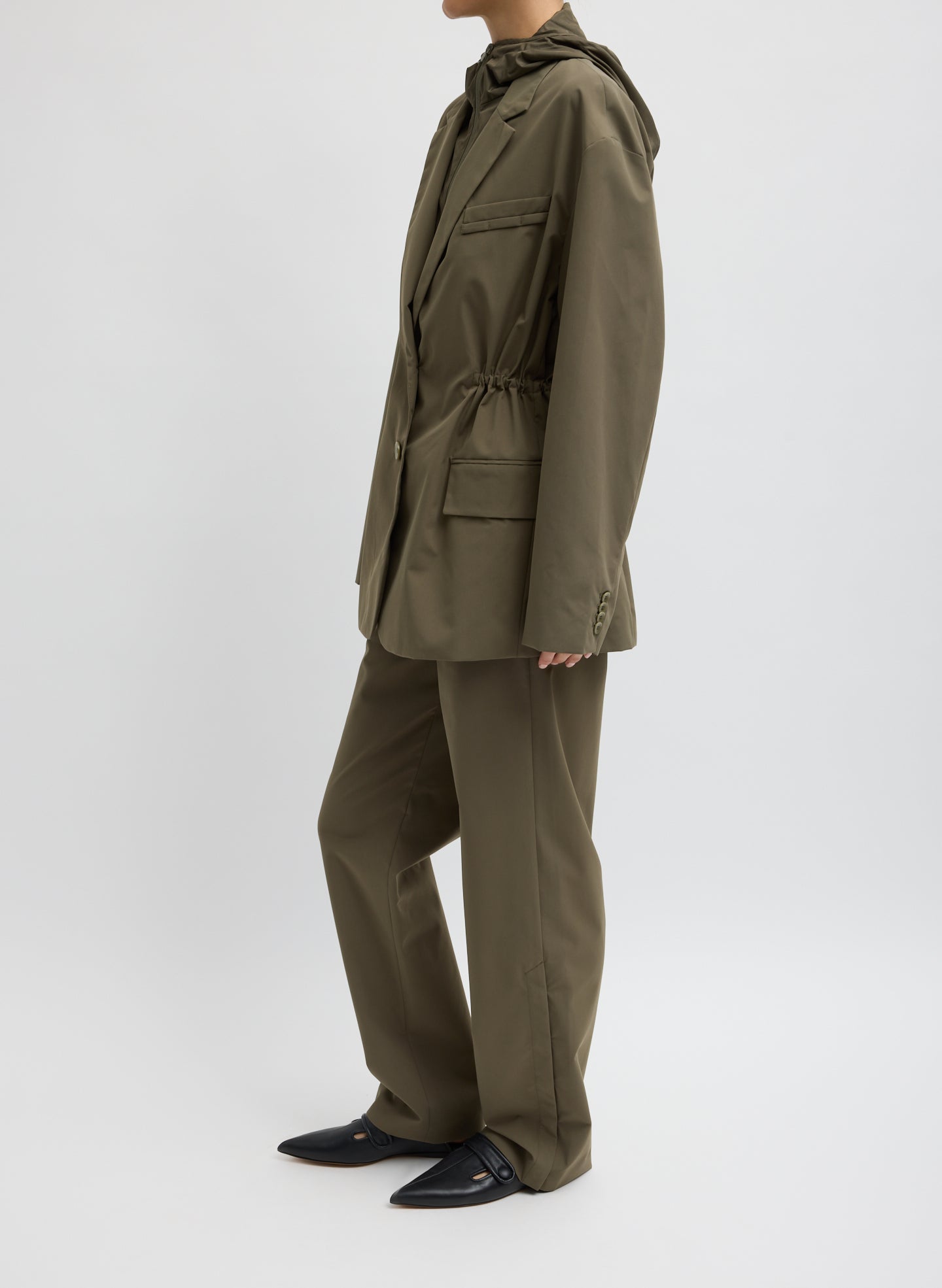 Dark Hazelnut Green Tech Suiting Anorak Blazer With Zip Off Vest - side view on model