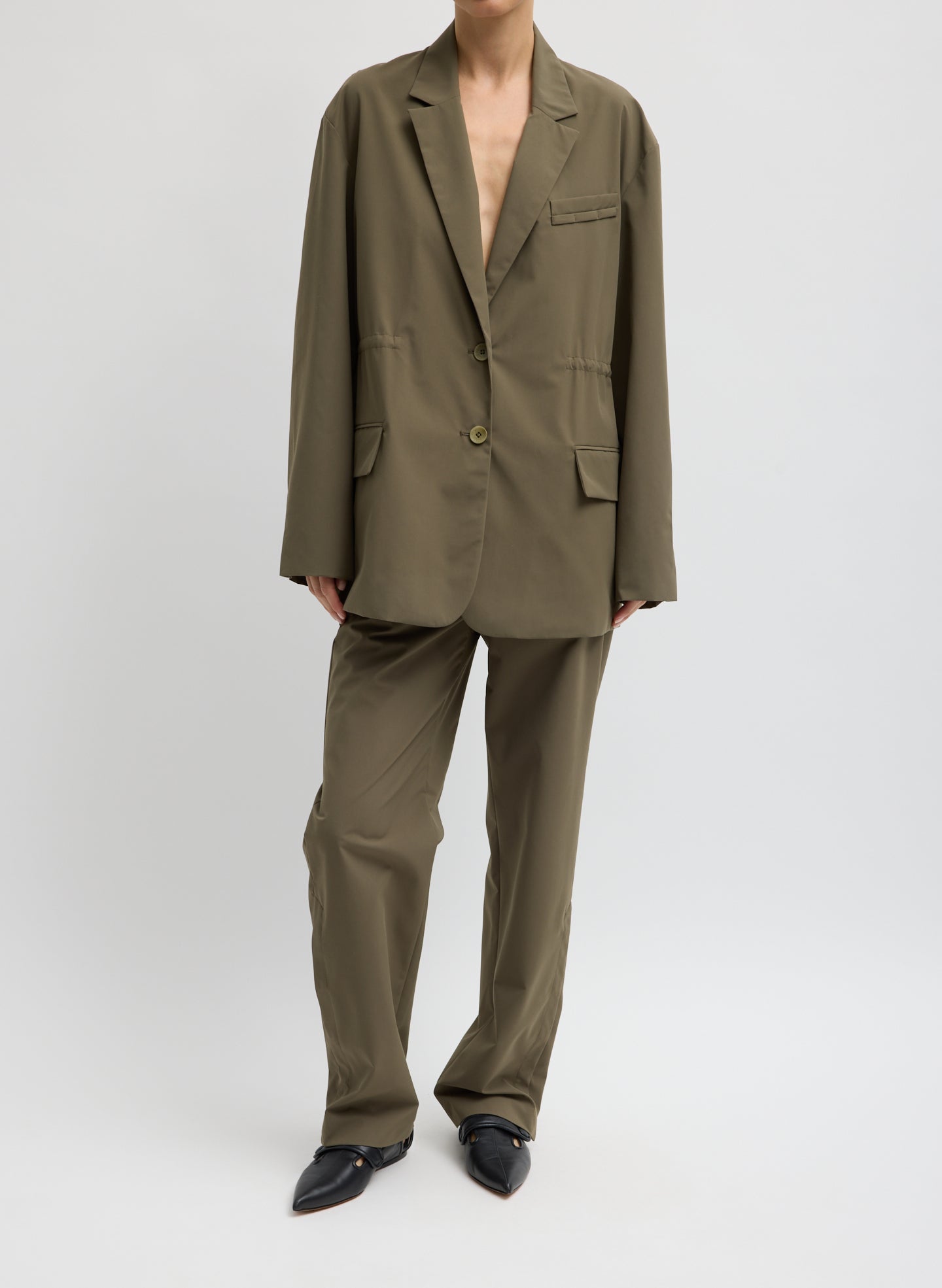 Dark Hazelnut Green Tech Suiting Anorak Blazer With Zip Off Vest - with vest removed, uncinched, front view on model