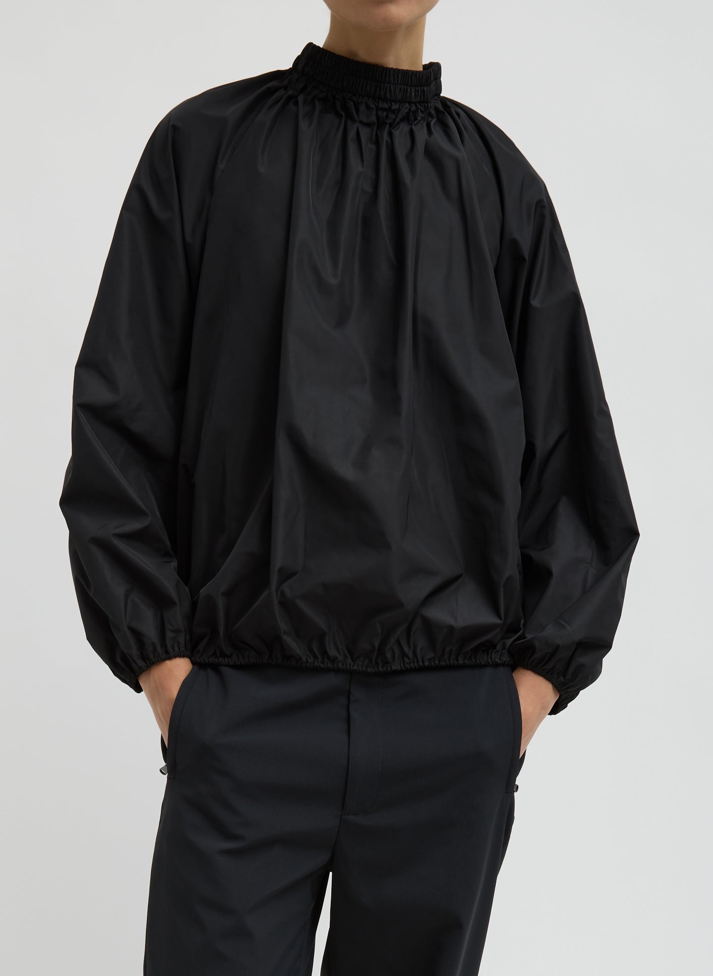 Black Italian Sporty Nylon Shirred Anorak Top - front view on model