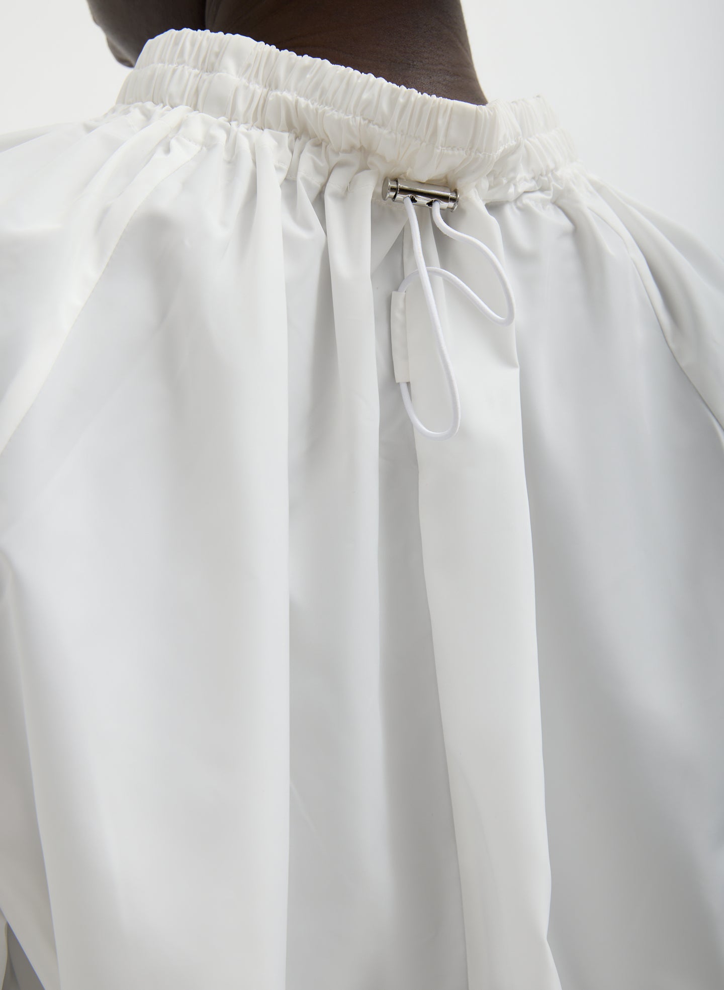 White Italian Sporty Nylon Shirred Anorak Top - closeup of drawstring detail at back