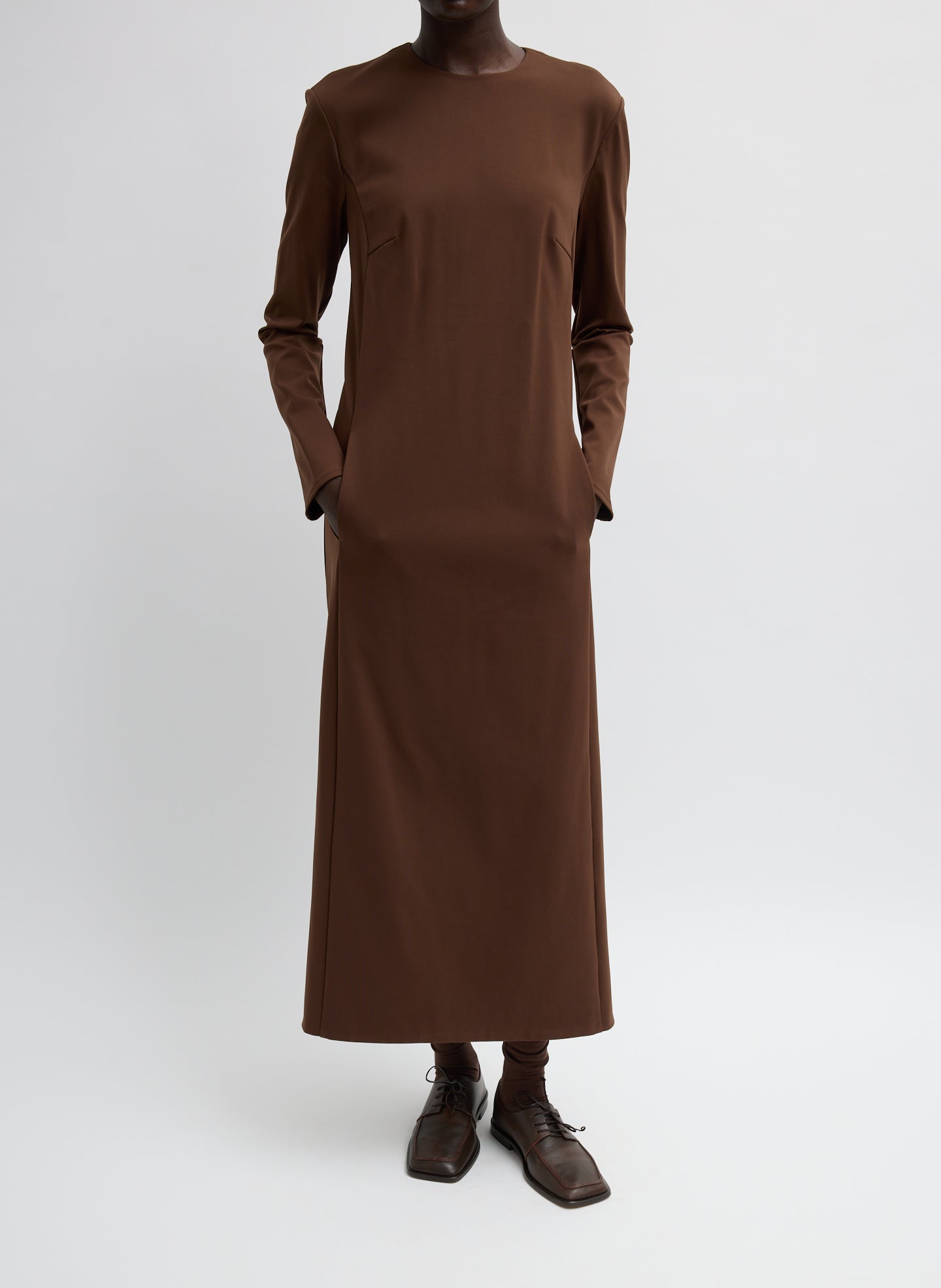 Brown Compact Ultra Stretch Knit Dress With Cut Out Back - long sleeve maxi dress, front view on model